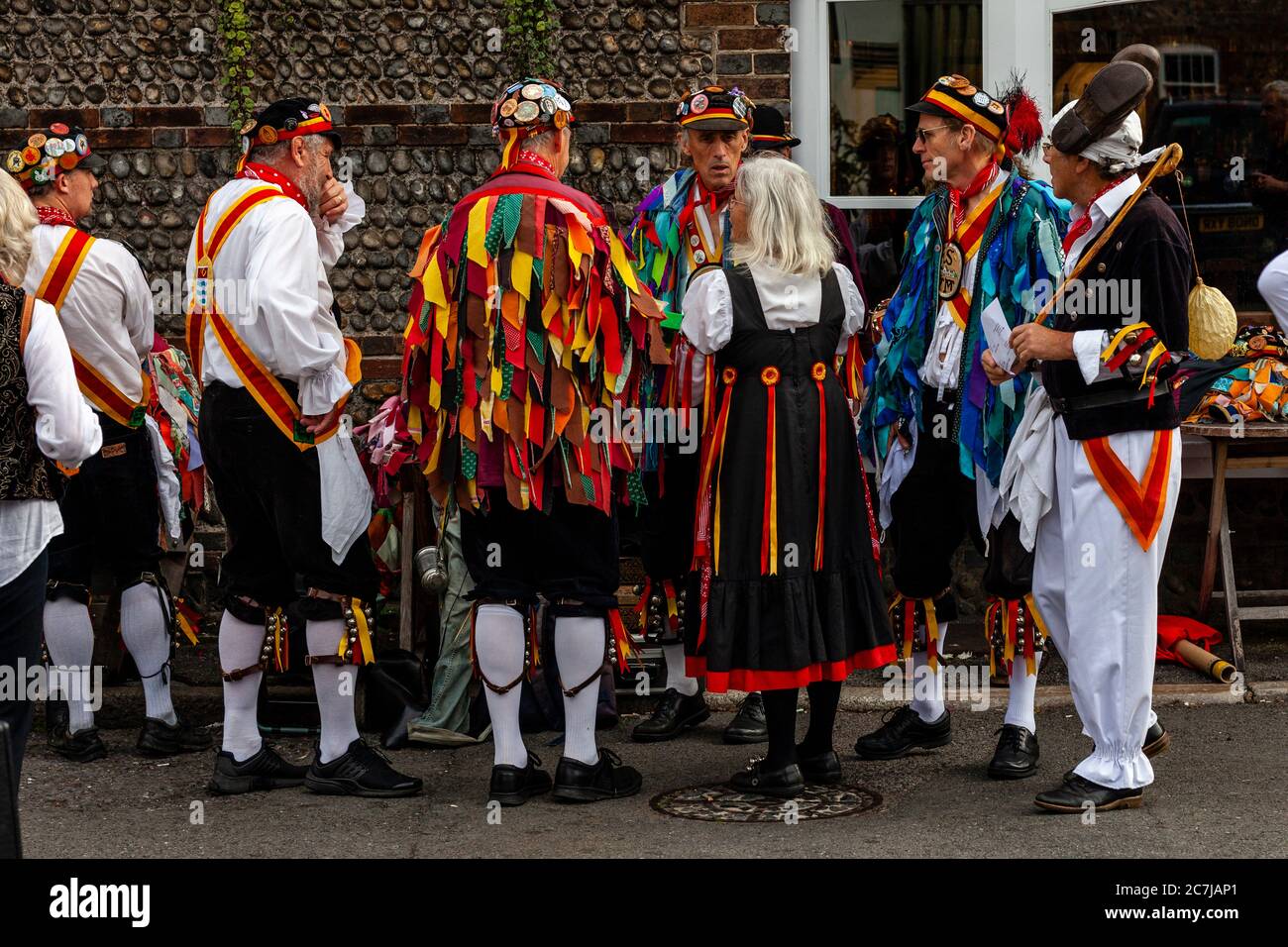 Morris Dancing Sides Get Ready To Perform During The Lewes Folk Festival, High Street, Lewes, East Sussex, UK Stock Photo