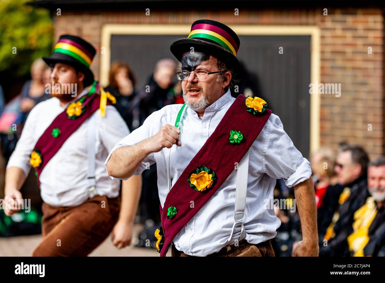 Morris Dancing Sides Perform During The Lewes Folk Festival, High Street, Lewes, East Sussex, UK Stock Photo