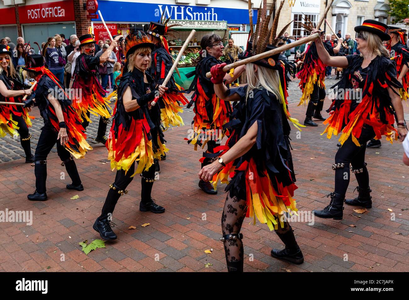 A Morris Dancing Side Perform During The Lewes Folk Festival, High Street, Lewes, East Sussex, UK Stock Photo