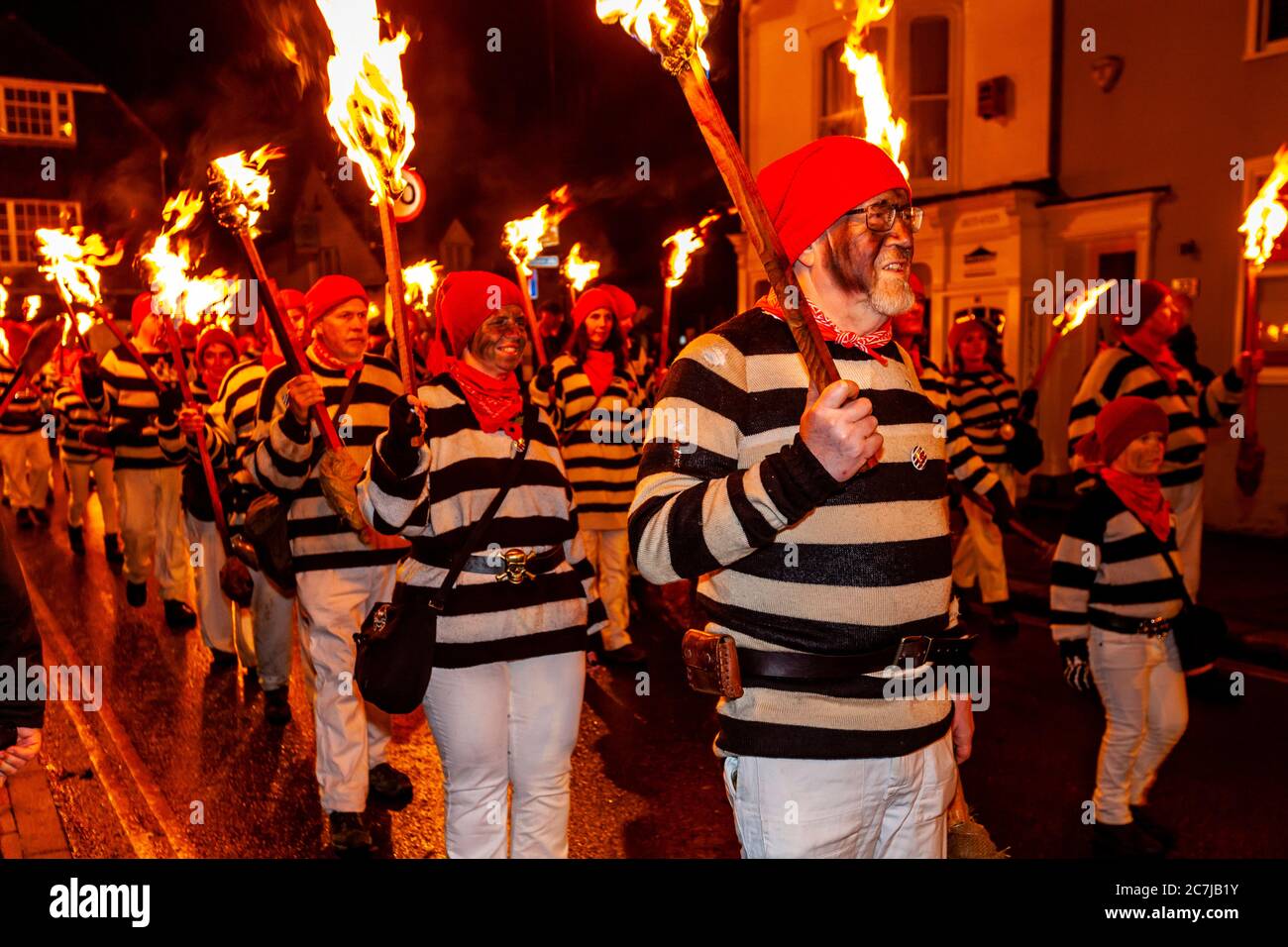 Local People Take Part In A Torchlight Street Procession During Bonfire Night (Guy Fawkes Night) Celebrations, Lewes, East Sussex, UK Stock Photo