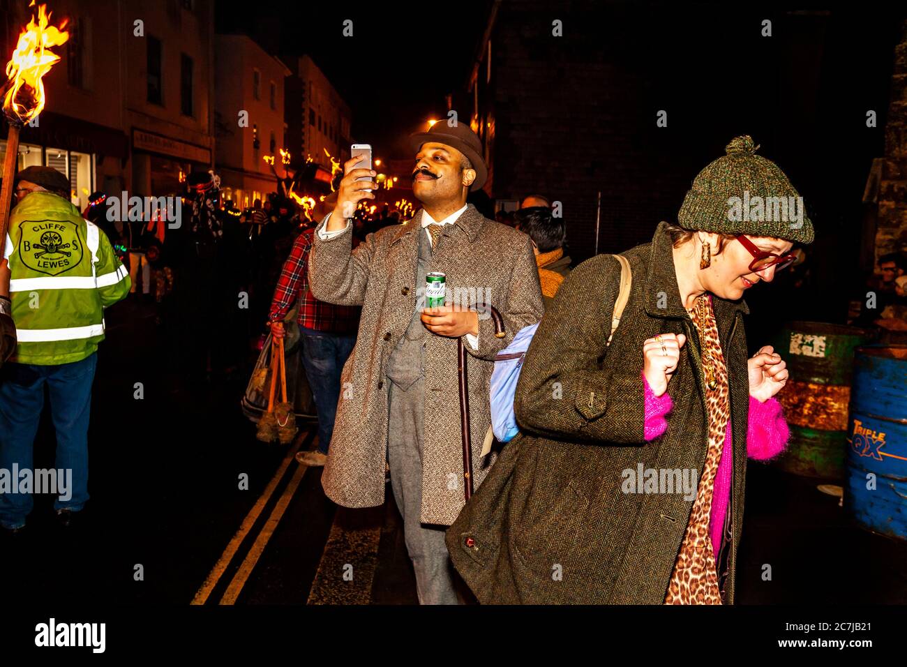 Visitors Watch The Bonfire Night (Guy Fawkes Night) Celebrations, Lewes, East Sussex, UK Stock Photo