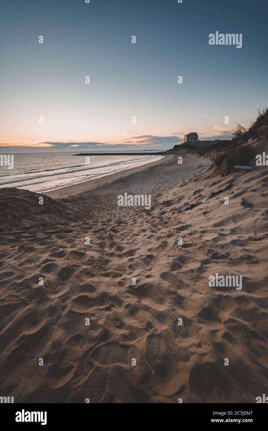 Beautiful scenery of the sunset reflecting in the sea Stock Photo - Alamy