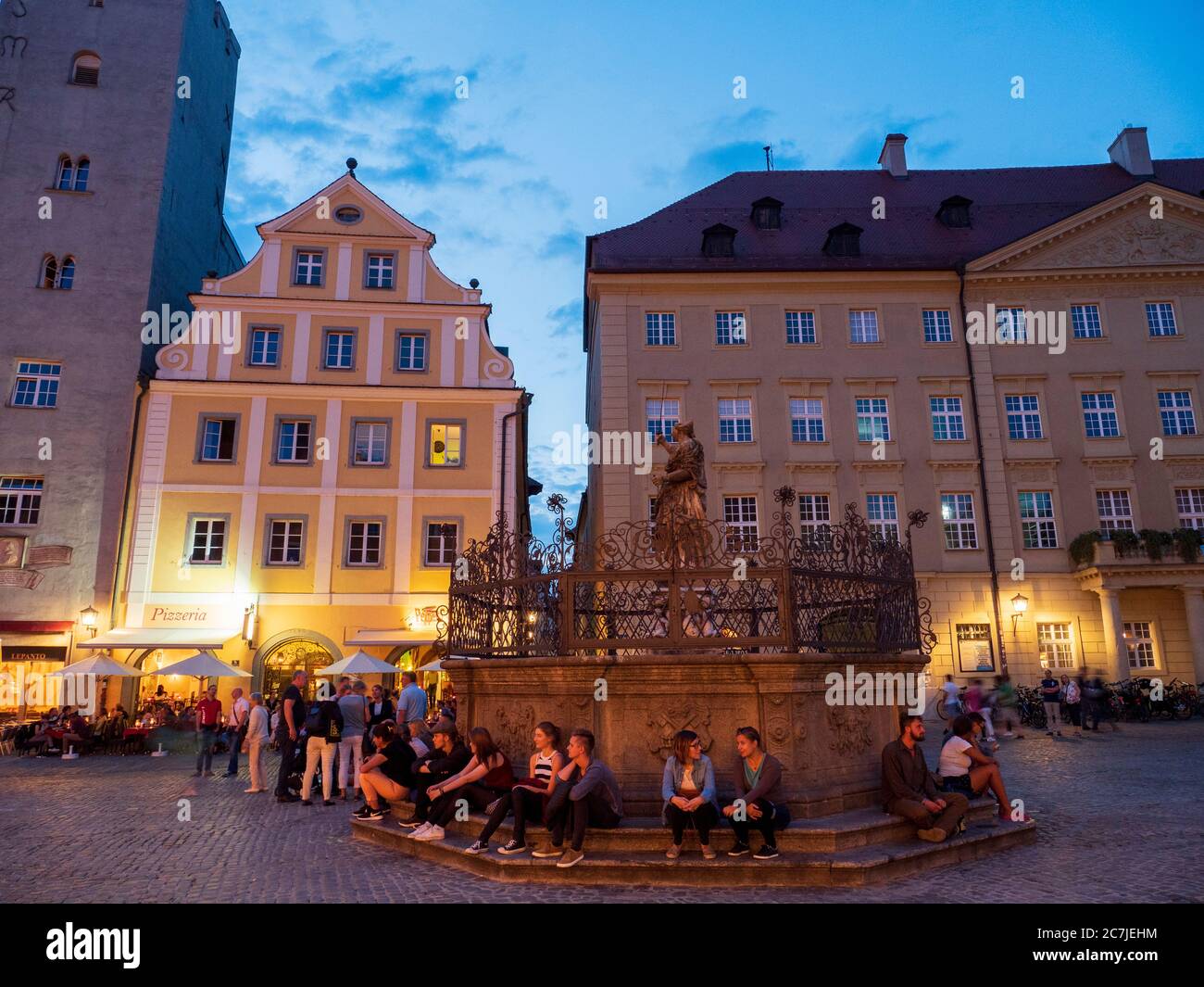 Regensburg, old town, Justitia fountain at Haidplatz, dusk, Bavaria, Germany Stock Photo