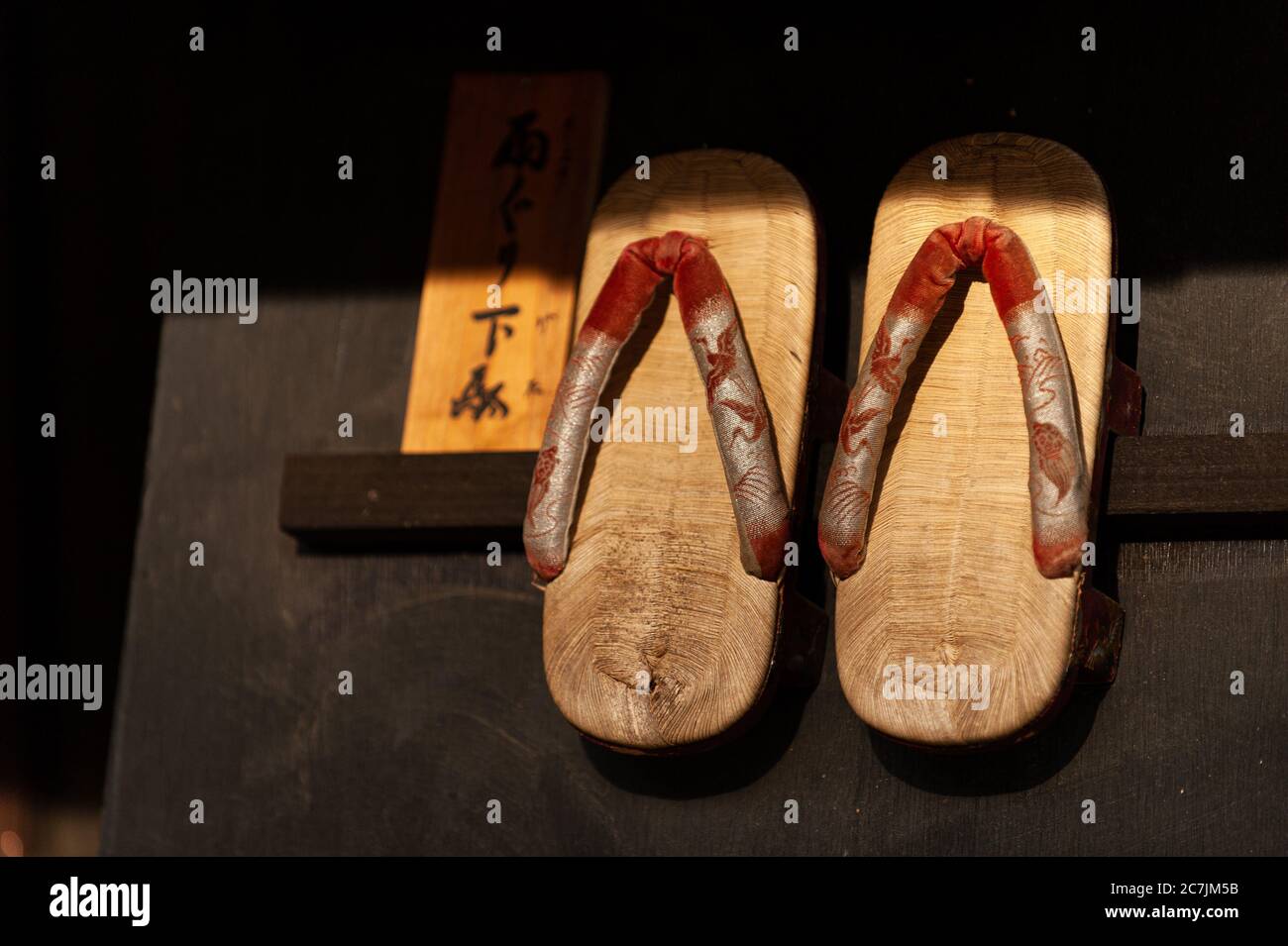 Traditional Japanese wooden shoes for sale in souvenir shops, Geta is a shoe  that we often see Japanese people wear when wearing a yukata or kimono  Stock Photo - Alamy