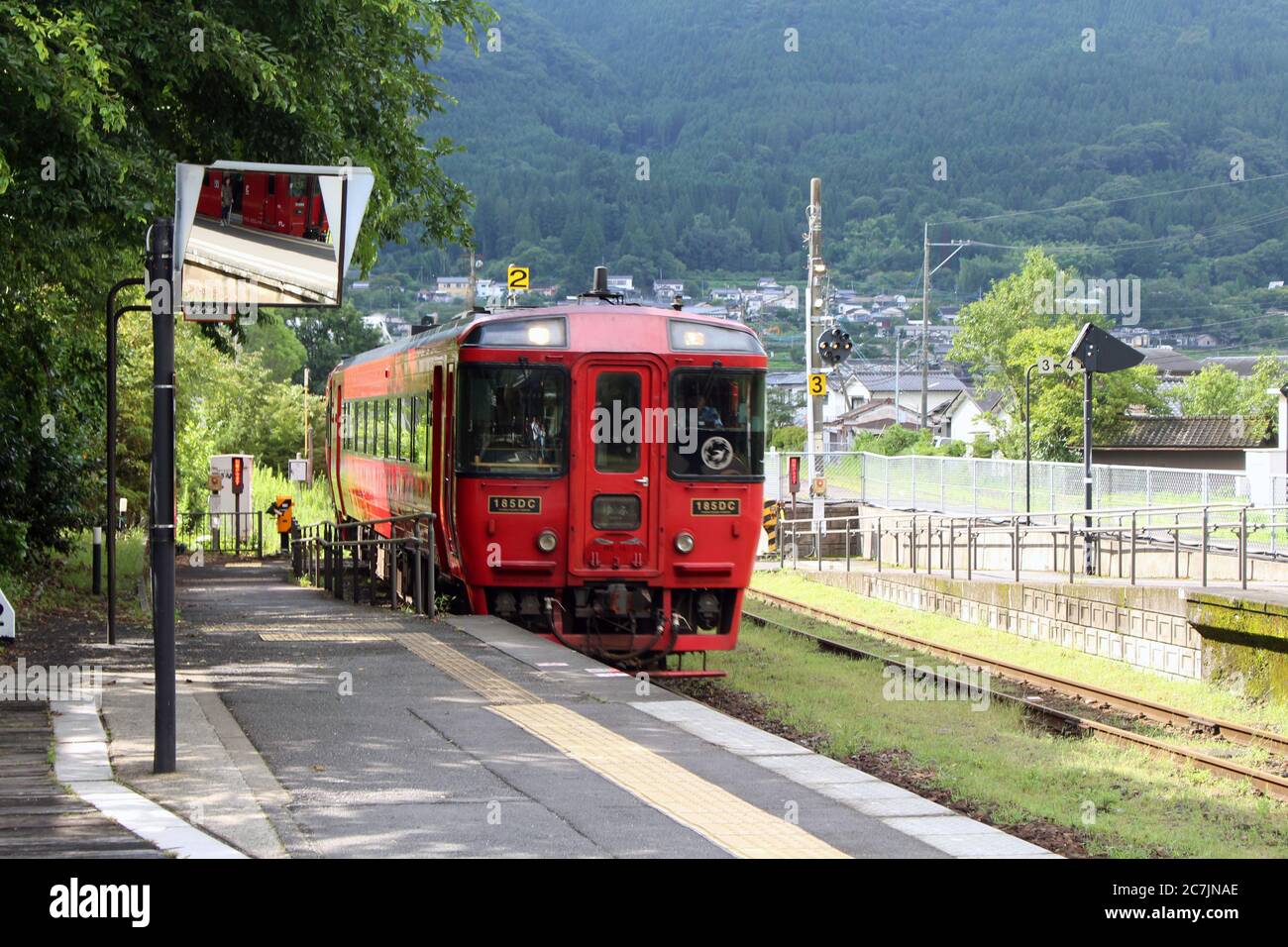 Red Train Stopping At Yufuin Station In Oita Japan Taken In June 19 Stock Photo Alamy