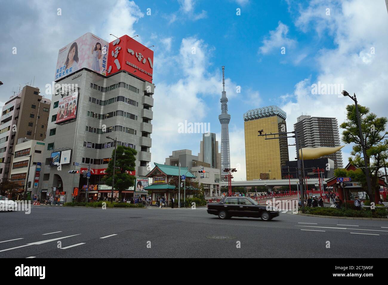 Tokyo / Japan - May 25 2015 : View of the city from the front of Asakusa Station on the Azuma Bridge area. Overlooking the Tokyo Sky Tree and many tal Stock Photo