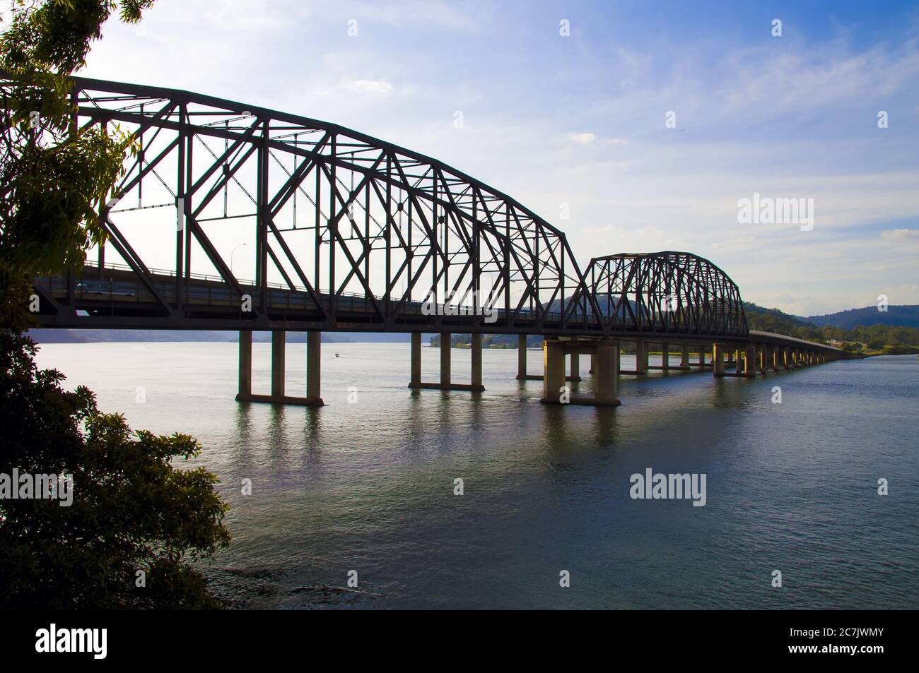 Bridge in the ocean in Brooklyn, Australia under the sky during the daytime Stock Photo
