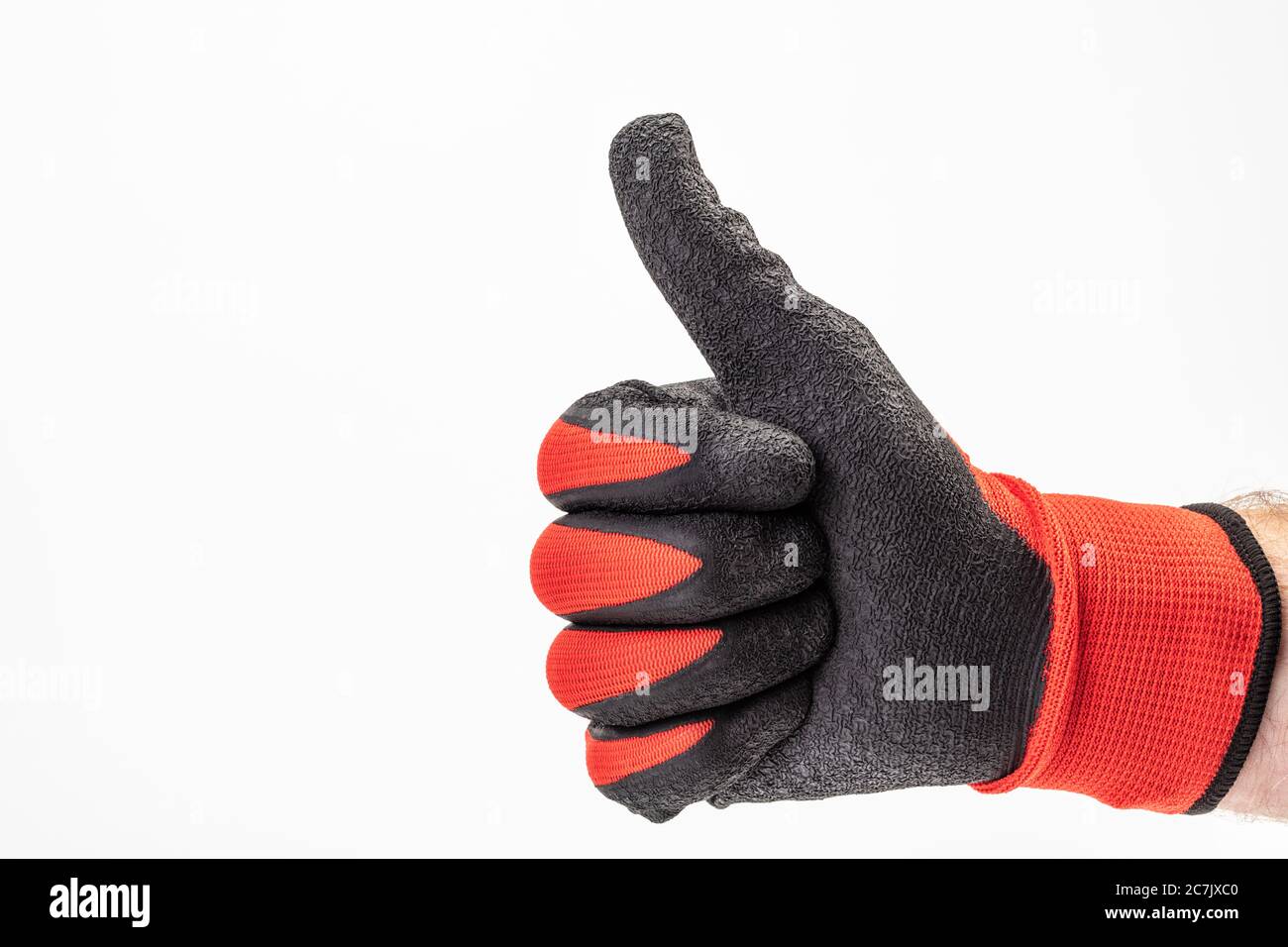 Male hand with gardening glove, thumbs up, white background, Stock Photo