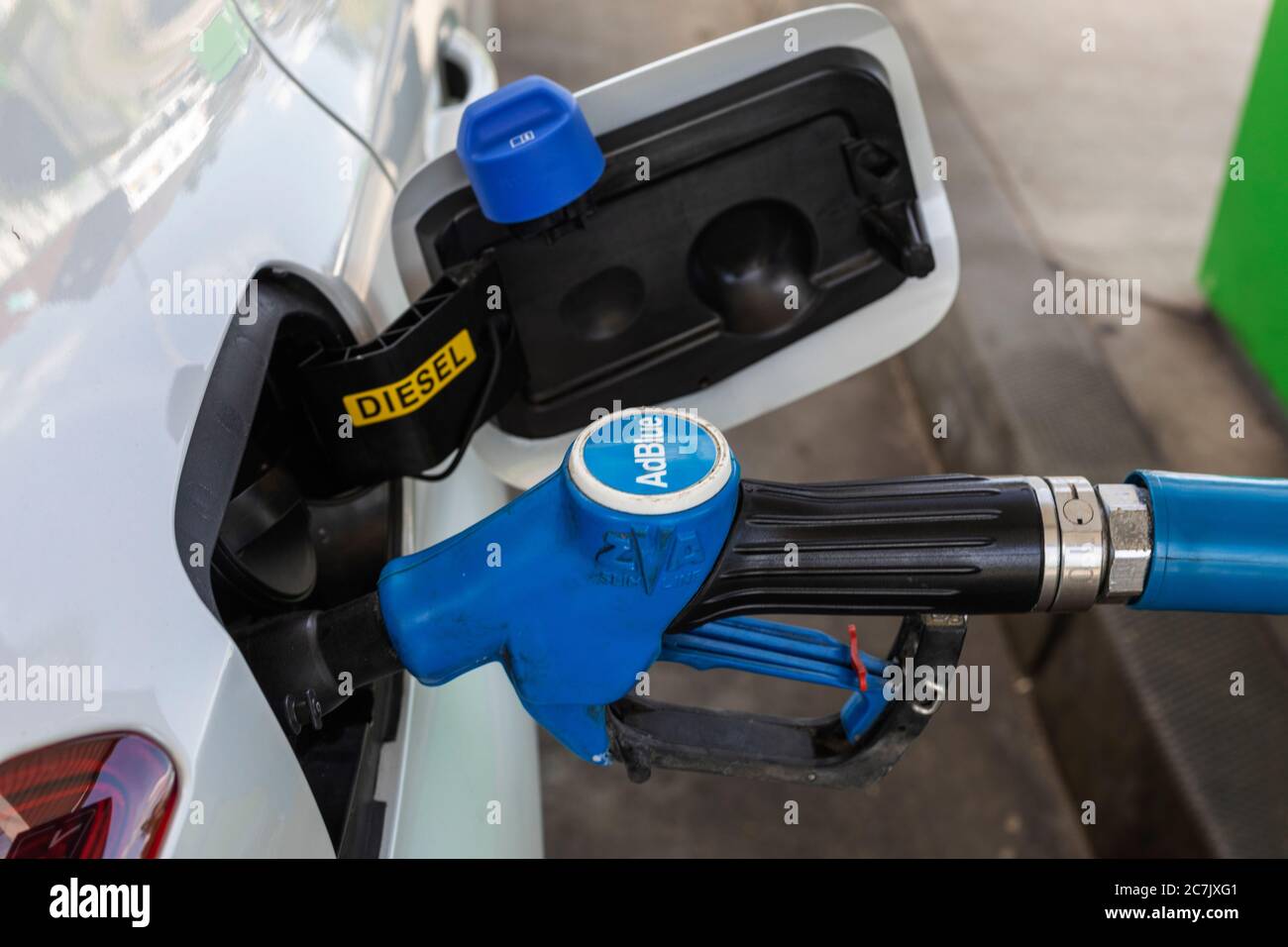 Car is filled with Ad Blue urea solution, detail, tap, fuel filler neck