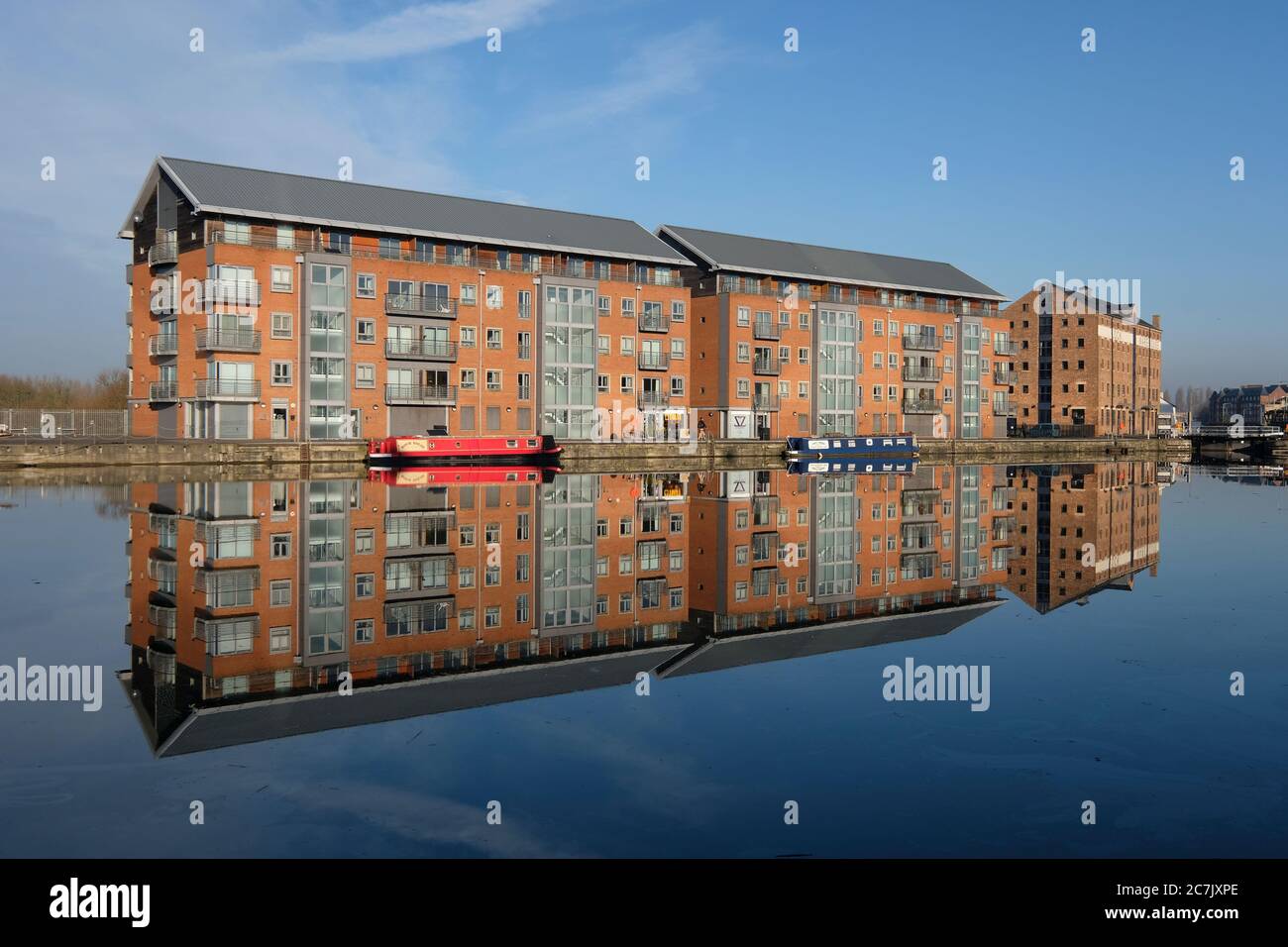 Boats moored in the Main Basin of Gloucester Docks on the Gloucester and Sharpness Canal in southern England Stock Photo