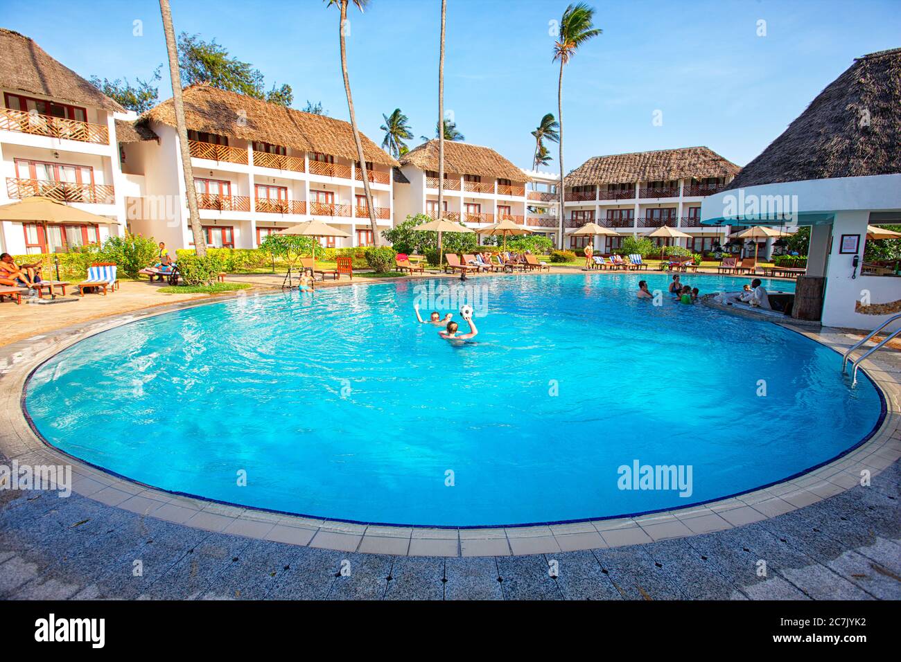 Hotel with swimming pool in beachfront, Nungwi, Zanzibar, Tourists