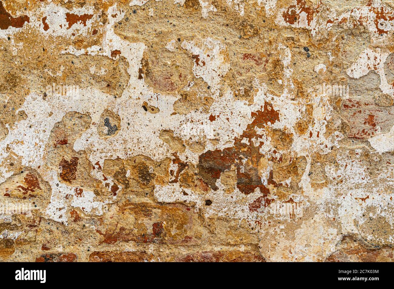 Old wall with bricks, house facade, background picture Stock Photo