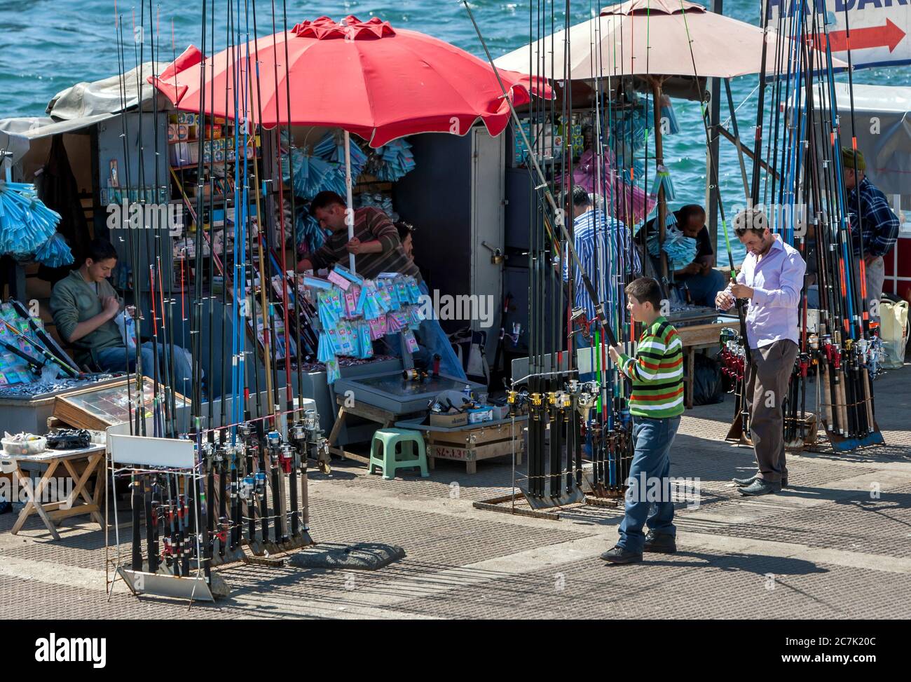 Fishing shops selling rods, sinkers and hooks located adjacent to Golden Horn in the Karakoy district of Istanbul in Turkey. Stock Photo