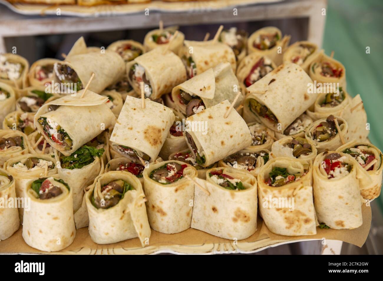 Closeup of wraps on the table under the lights with a blurry background Stock Photo
