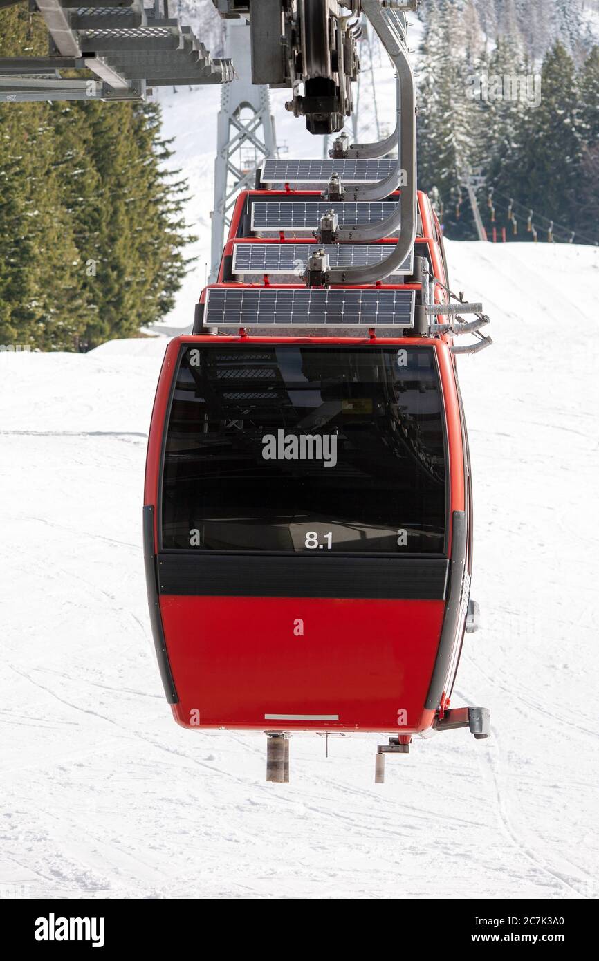 Winter scenery of a ropeway surrounded by the snowy mountains Stock ...