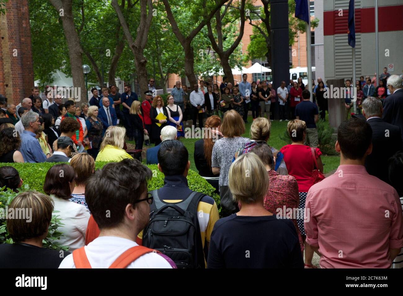 Students and invited guests attend the traditional Remembrance Day service at Ultimo TAFE in Sydney. Stock Photo