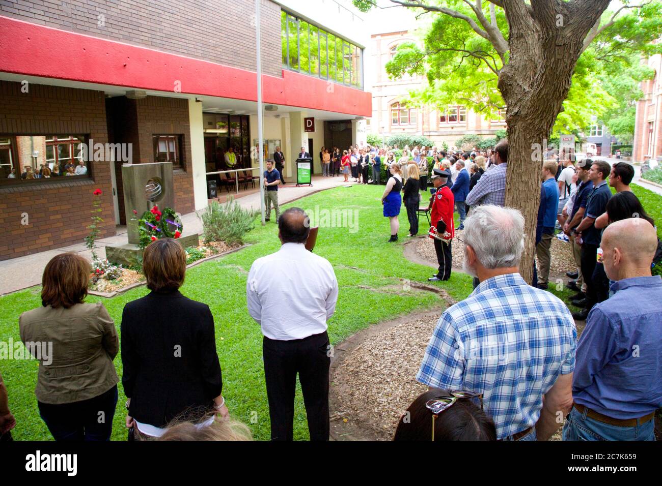 Students and invited guests attend the traditional Remembrance Day service at Ultimo TAFE in Sydney. Stock Photo