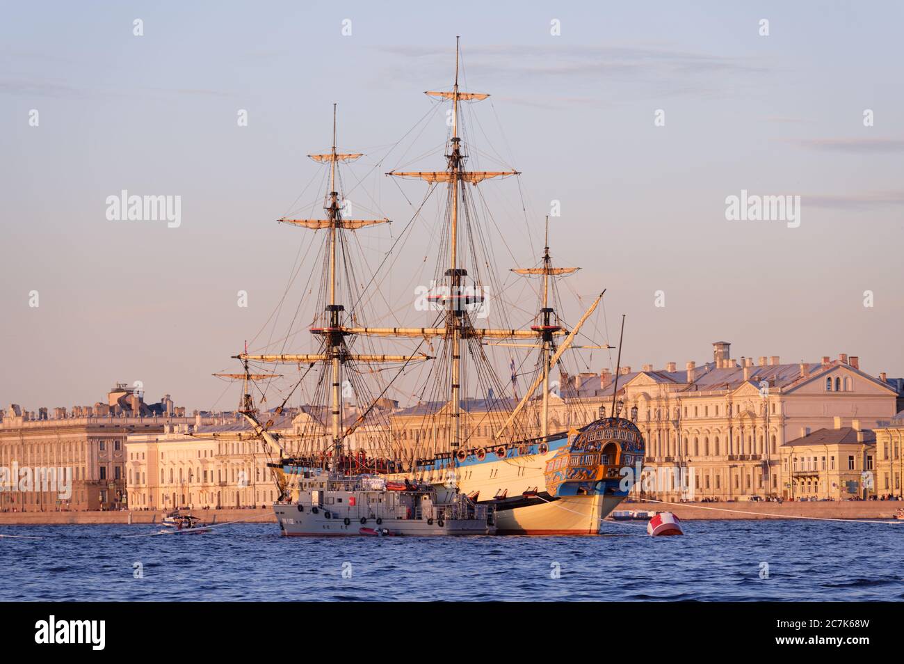 People watching historical ship Poltava anchored in Neva river during preparations to Russian Navy Day parade in St. Petersburg, Russia Stock Photo