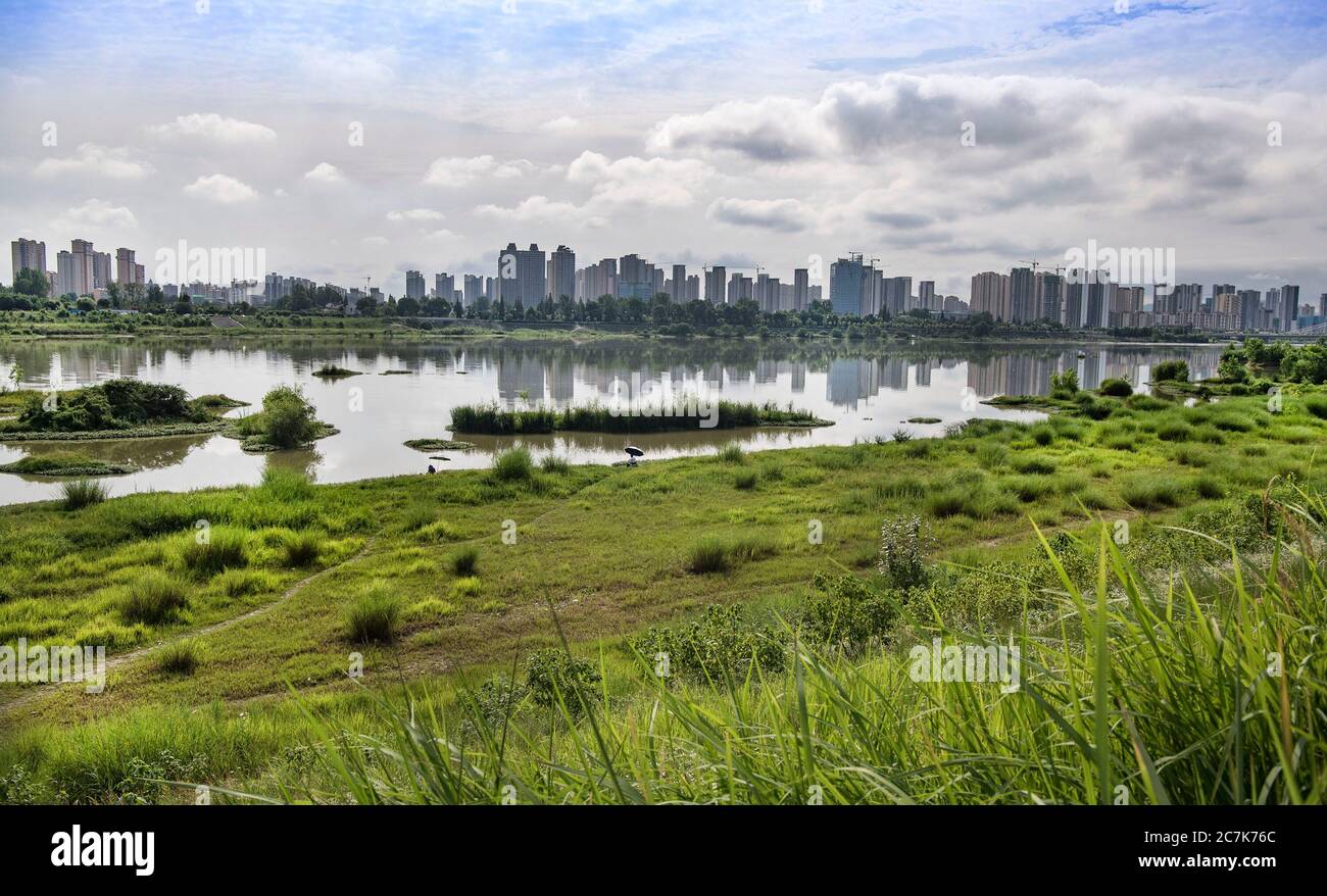 Hanzhong. 18th July, 2020. Photo taken on July 18, 2020 shows a view of Hanjiang wetland in Hanzhong City, northwest China's Shaanxi Province. Credit: Tao Ming/Xinhua/Alamy Live News Stock Photo