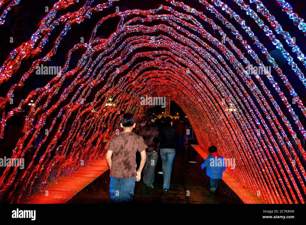 Lima, Peru - October 15, 2008: Magic Water Circuit (El Circuito Magico del Agua), water fountains at Park of the Reserve. People walking in Tunnel Fou Stock Photo