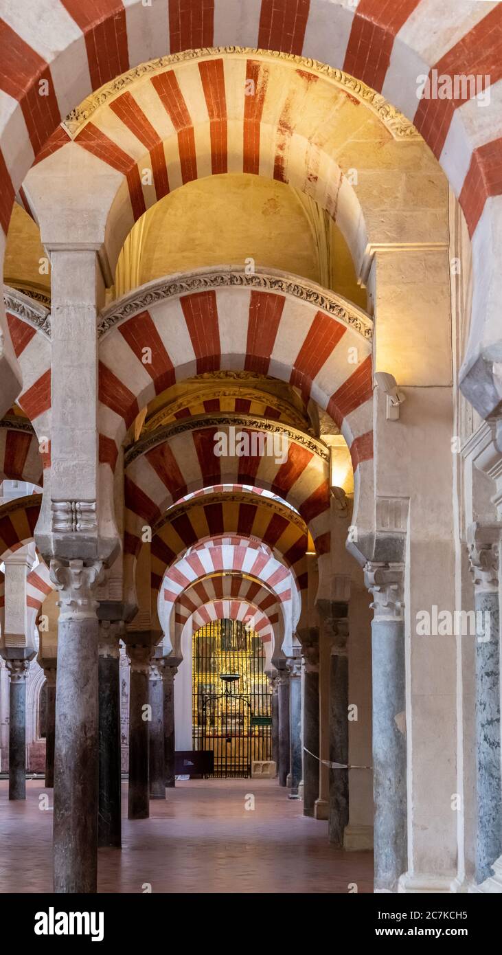 The columns and double-tiered arches in the original section of the Mosque-Cathedral of Cordoba Stock Photo
