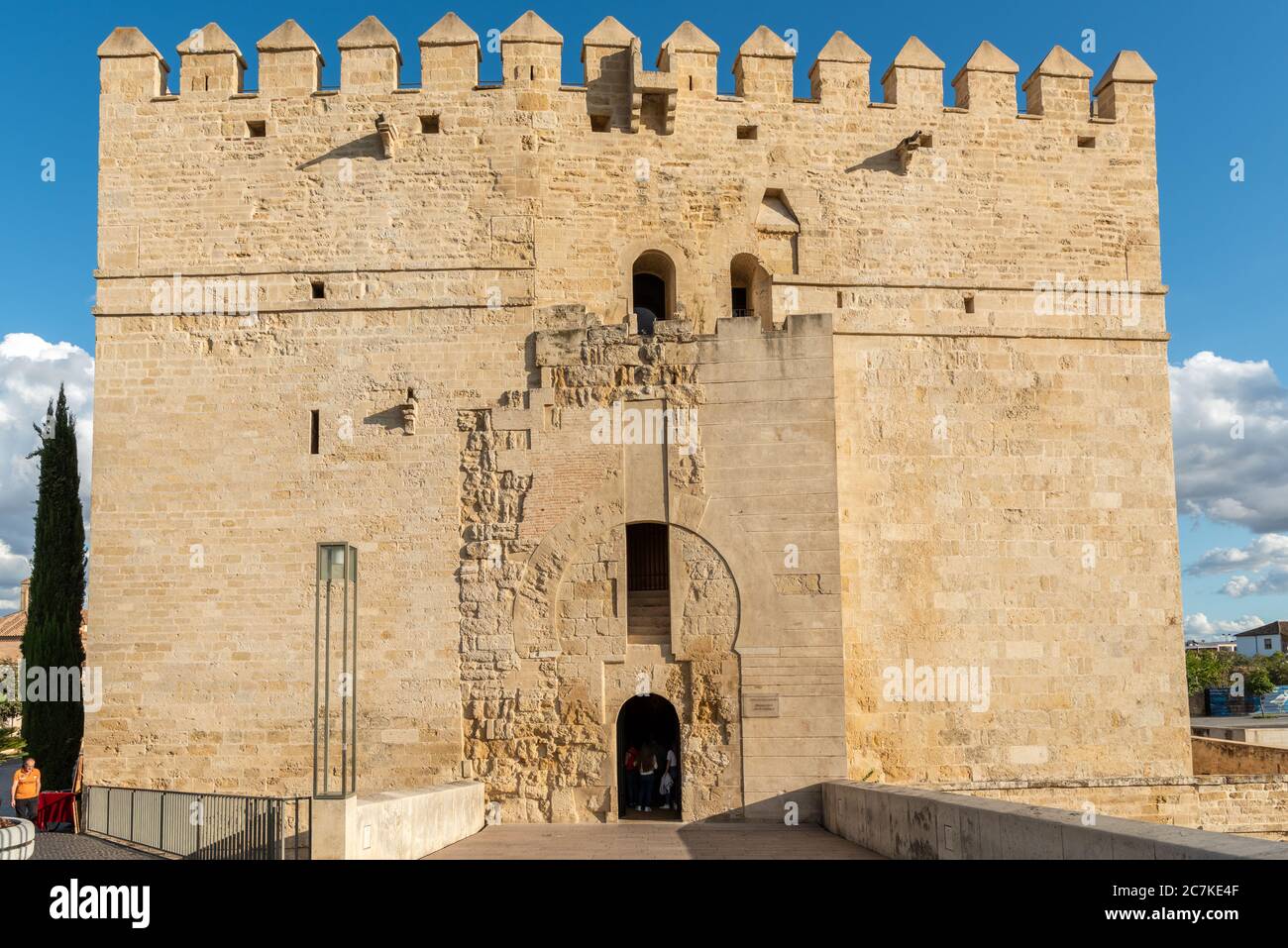 The historic Torre de la Calahorra in Cordoba was first erected by the Almohad Caliphate to protect the nearby Roman Bridge on the Guadalquivir river. Stock Photo