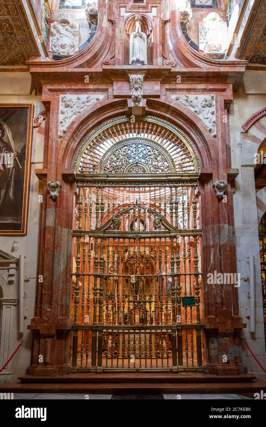 An elaborate brass screen and doors obscure the Altarpiece in the Chapel of Nuestra Señora de la Concepción in the Mosque-Cathedral of Cordoba Stock Photo