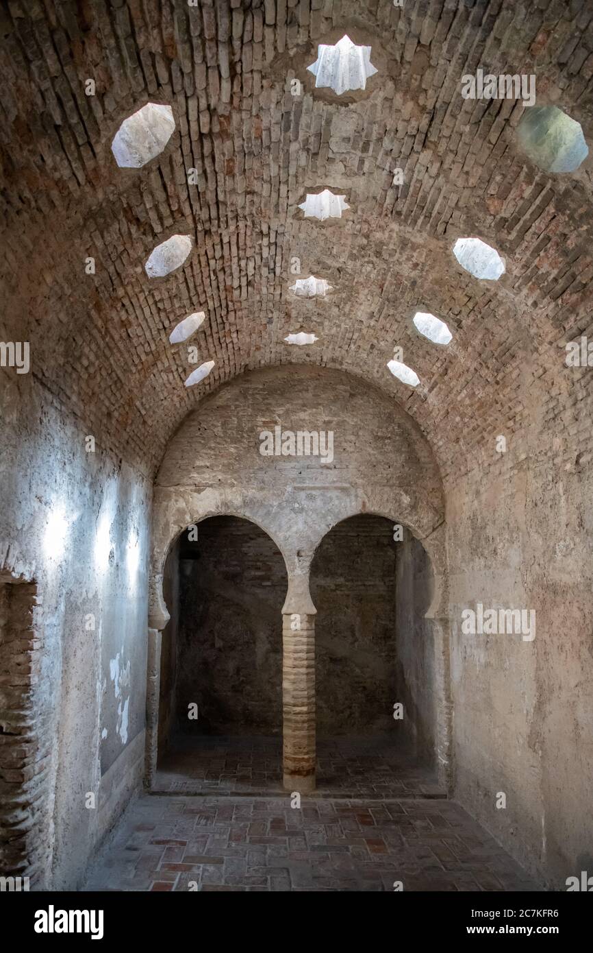 The ornate barrel vaulted cold room (bayt al-barid) of the 11th century Baño del Nogal historic Arabic baths in Ailbaicin, Granada Stock Photo