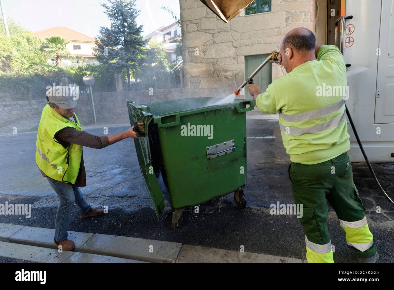 washing waste containers Stock Photo Alamy