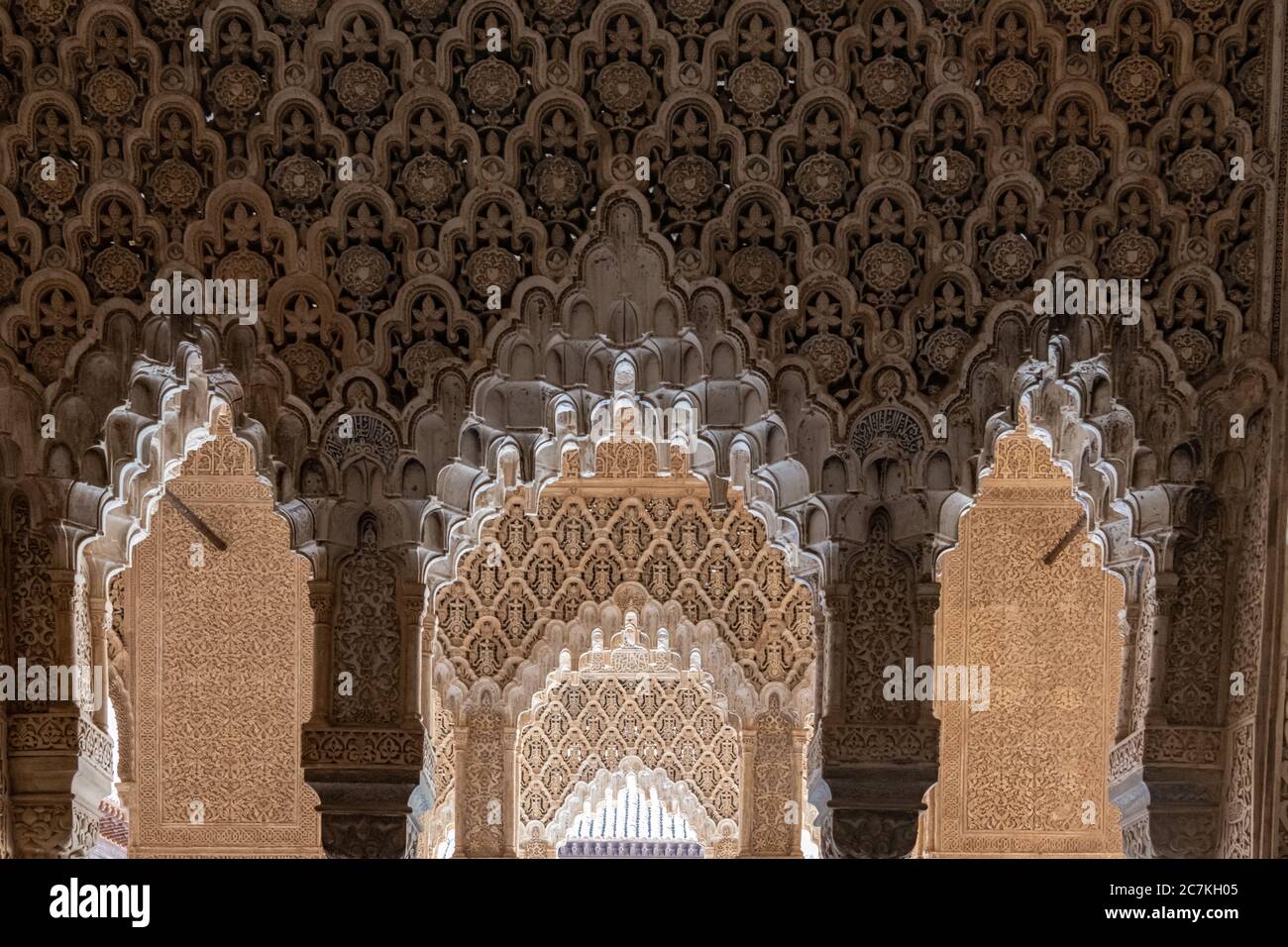 Like intricate lacework, the stone walls of the Hall of the Kings are covered in intricate arabesque designs. Stock Photo