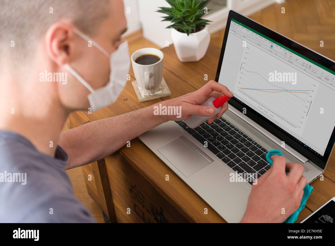 Home office, quarantine, COVID-19, face mask, clean Stock Photo