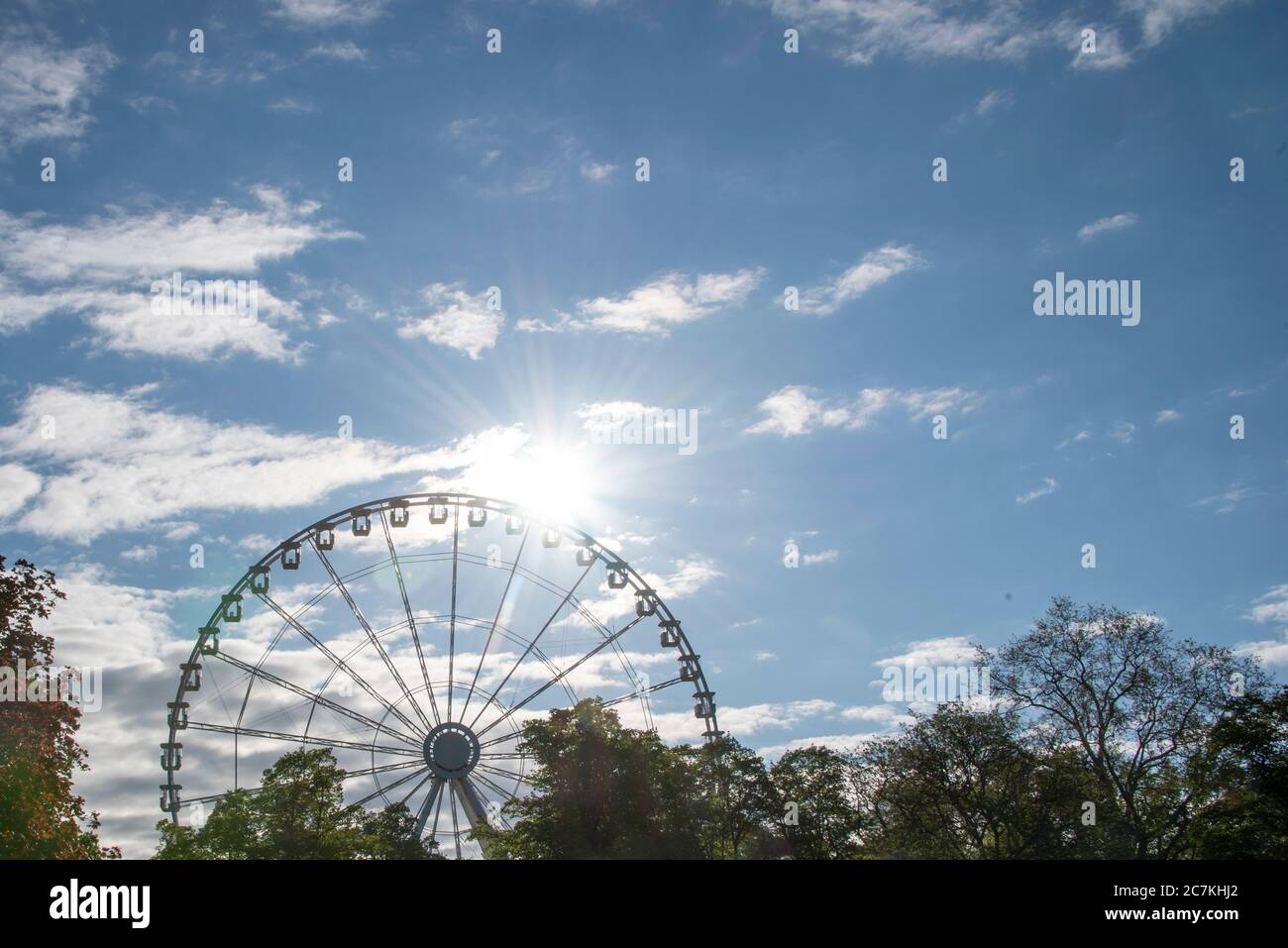 Germany, Saxony-Anhalt, Magdeburg: In the middle of the Corona crisis, a 55-meter-high ferris wheel was built in the Magdeburg city park. Stock Photo