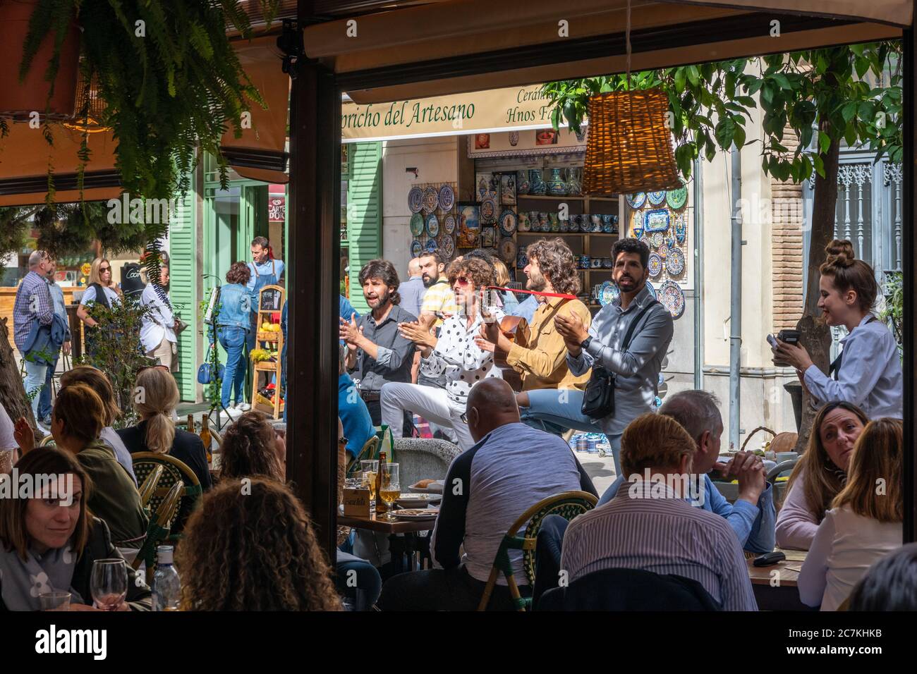 A band entertains diners at the Restaurante La Bicicleta in  Plaza Pescaderia, Granada Stock Photo