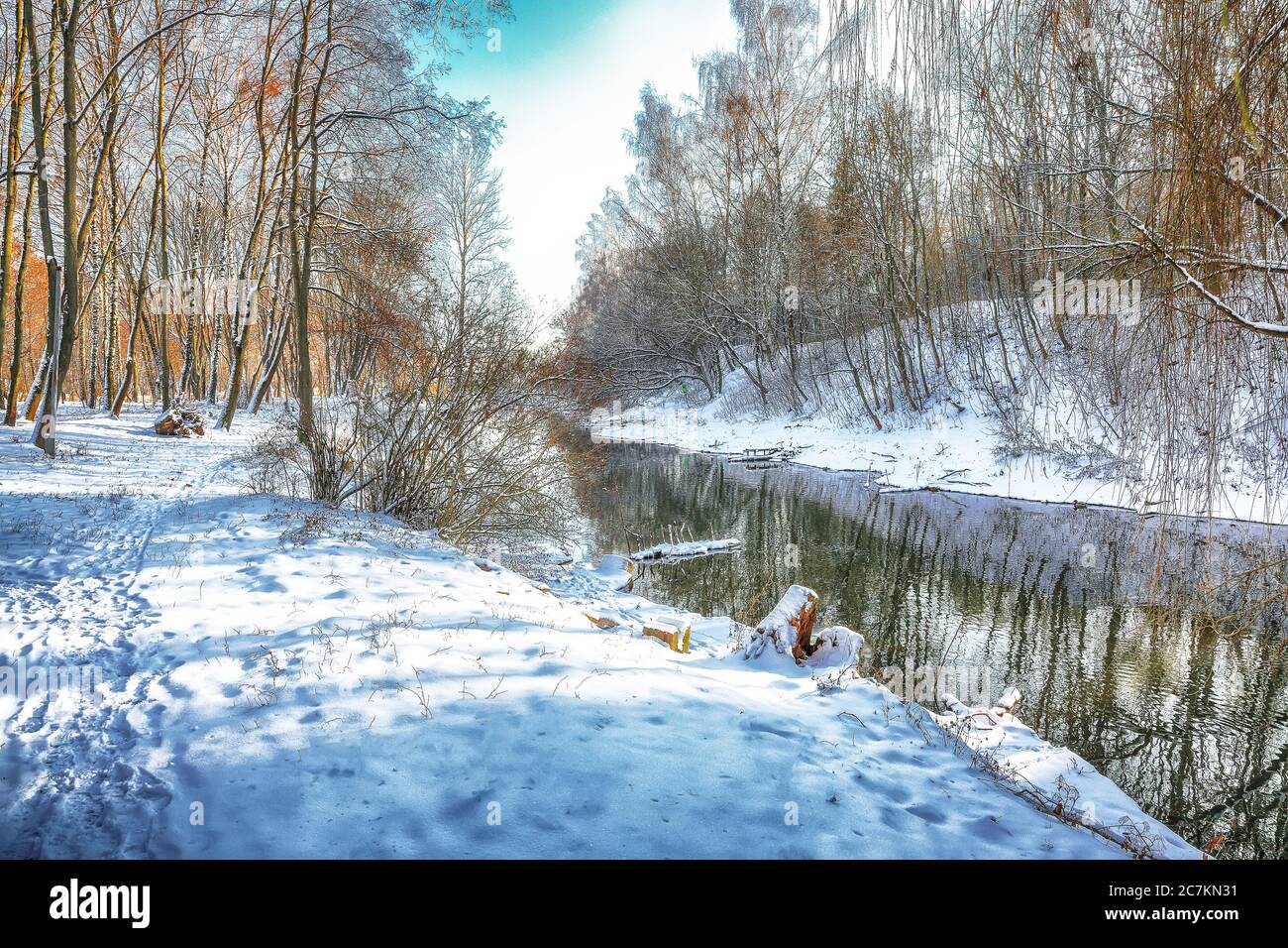 Scenic view of the river and trees covered by snow Stock Photo - Alamy
