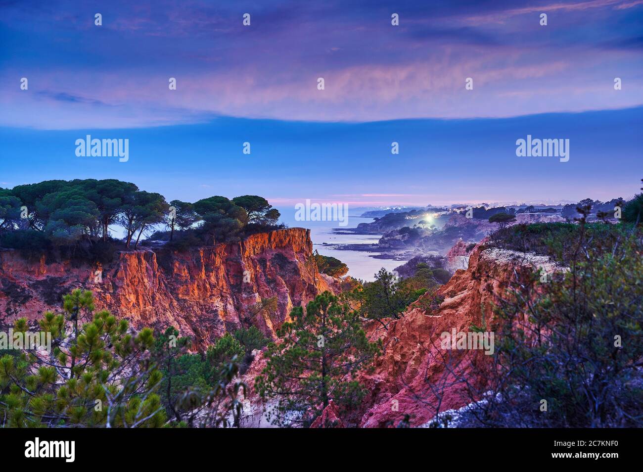 Europe, Portugal, Algarve, Litoral, Barlavento, Faro district, between Vilamoura and Albufeira, Olhos de Agua, sunset in a gorge on the cliffs Stock Photo