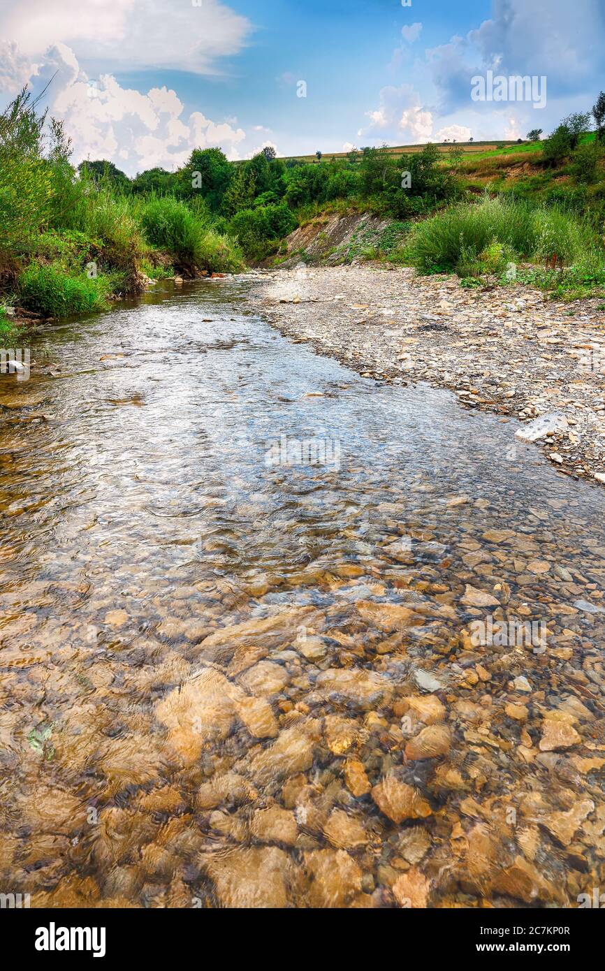 Blue Stream Made From Rocks Mountain river stream of water in the rocks with majestic blue sky ...