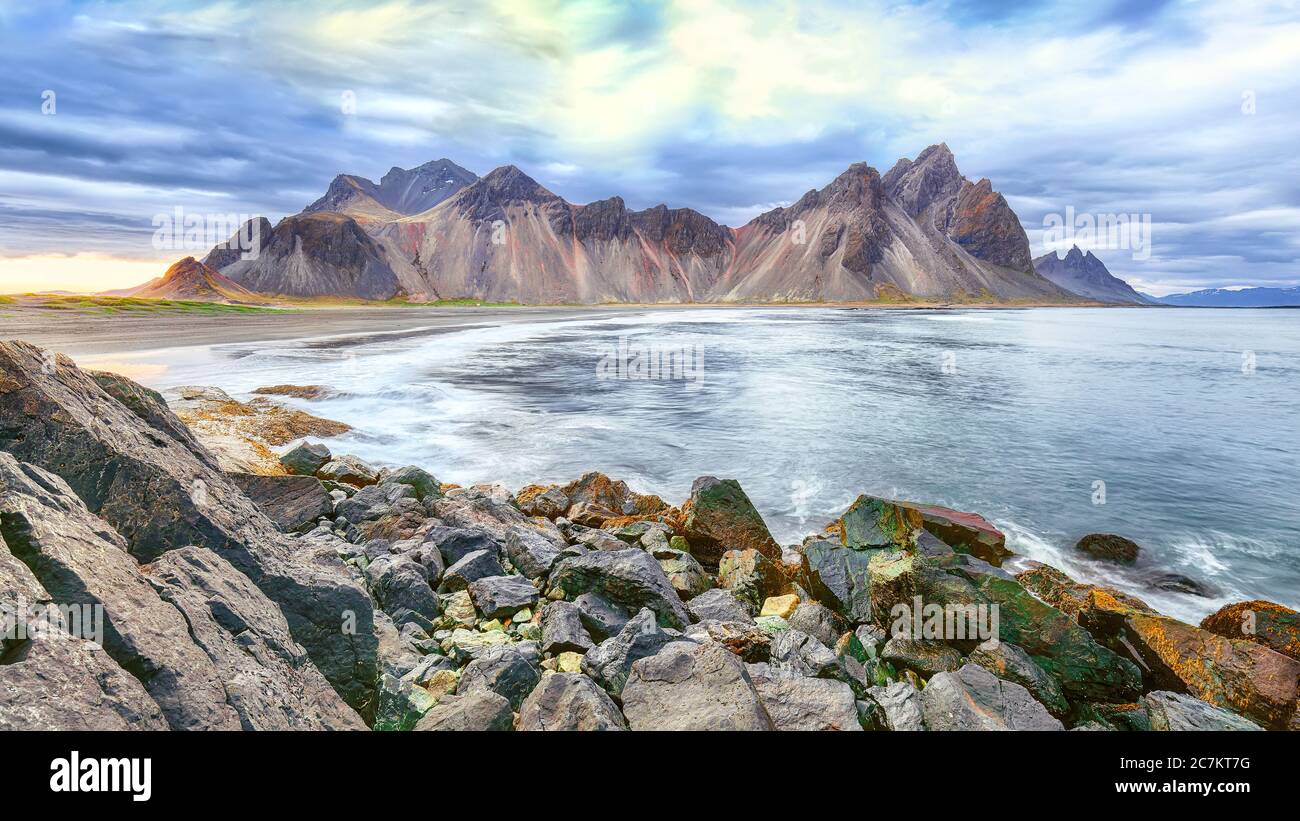 Dramatic black sand beach on Stokksnes cape in Iceland. Location: Stokksnes cape, Vestrahorn (Batman Mount), Iceland, Europe. Stock Photo