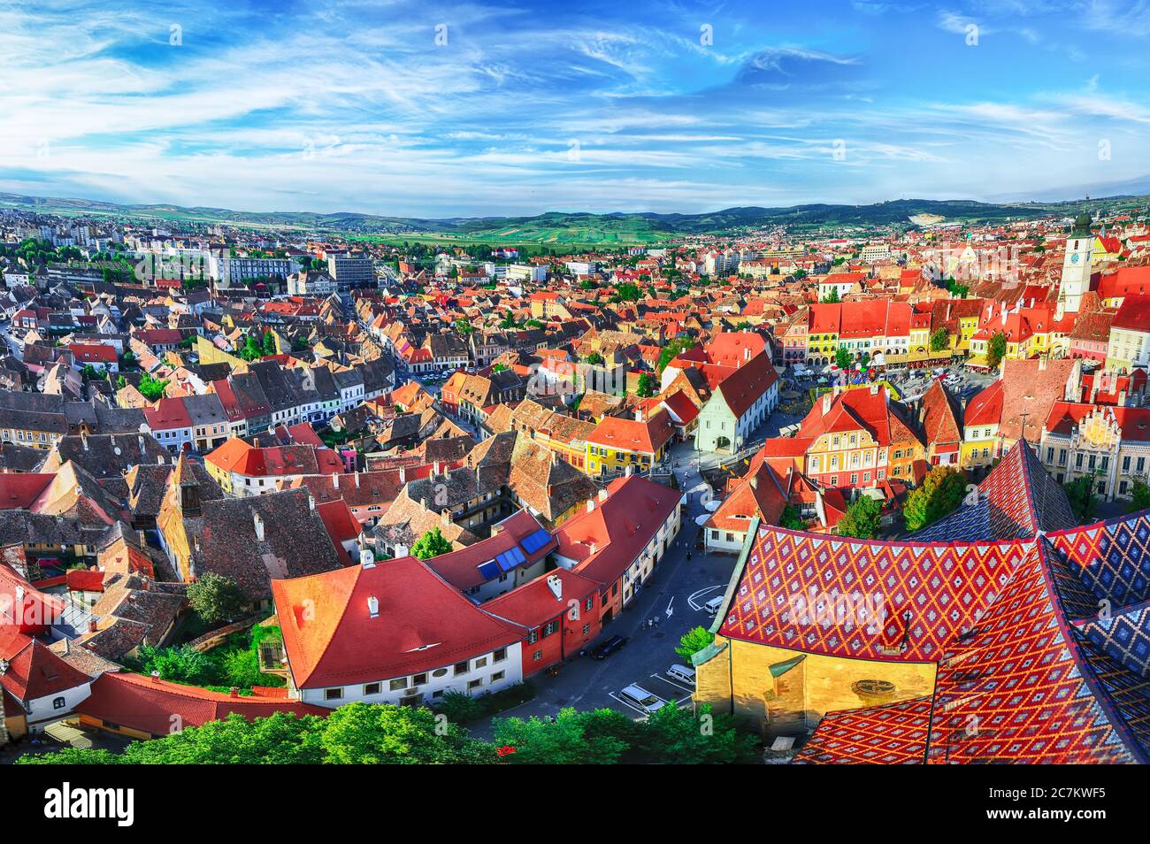 View from bell tower of St Mary Cathedral on the Old Town in Sibiu city. Aerial cityscape of Sibiu town. Impressive morning scene of Transylvania, Rom Stock Photo