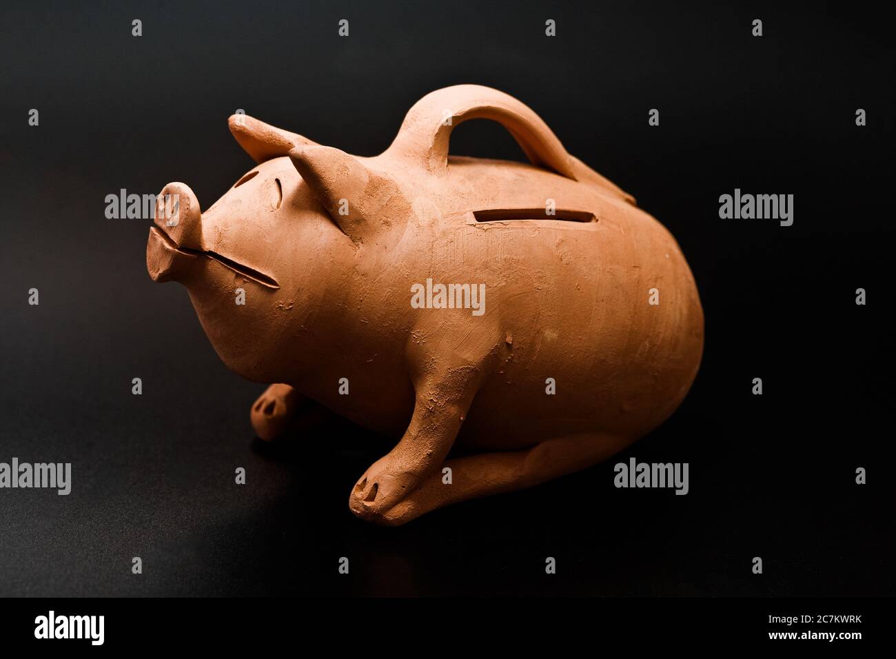 Mud piggy bank, shaped like a pig Stock Photo Alamy