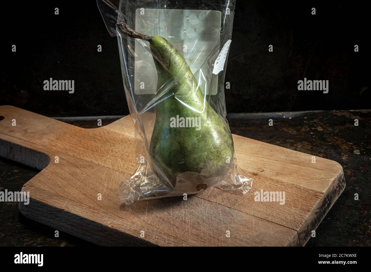 pear packed in non-biodegradable plastics Stock Photo
