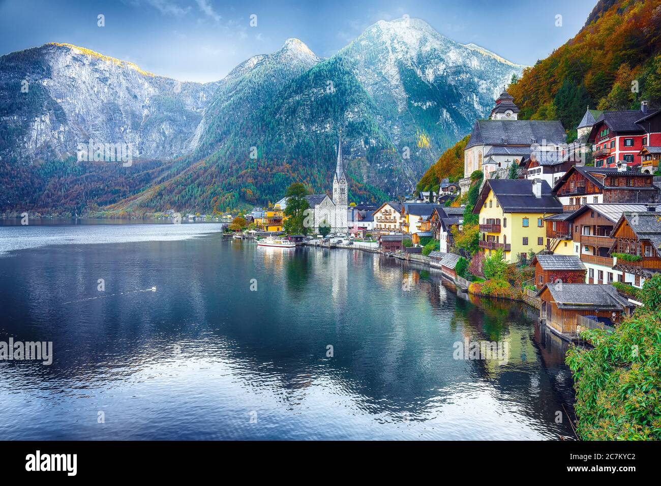 Scenic view of famous Hallstatt mountain village with Hallstatter lake ...