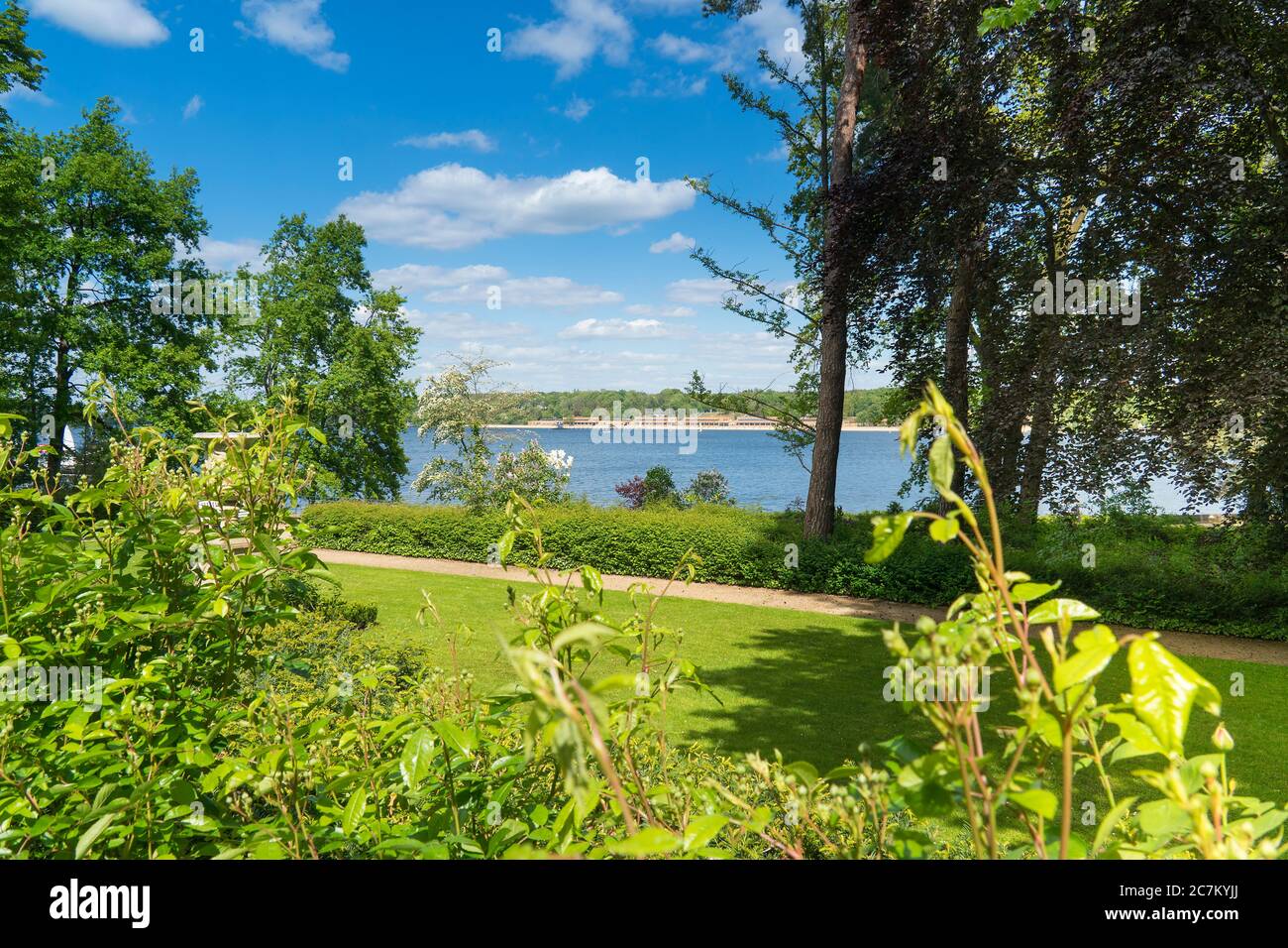 Berlin, Wannsee, House of the Wannsee Conference, garden to the lake side, distant view of the Wannsee lido Stock Photo