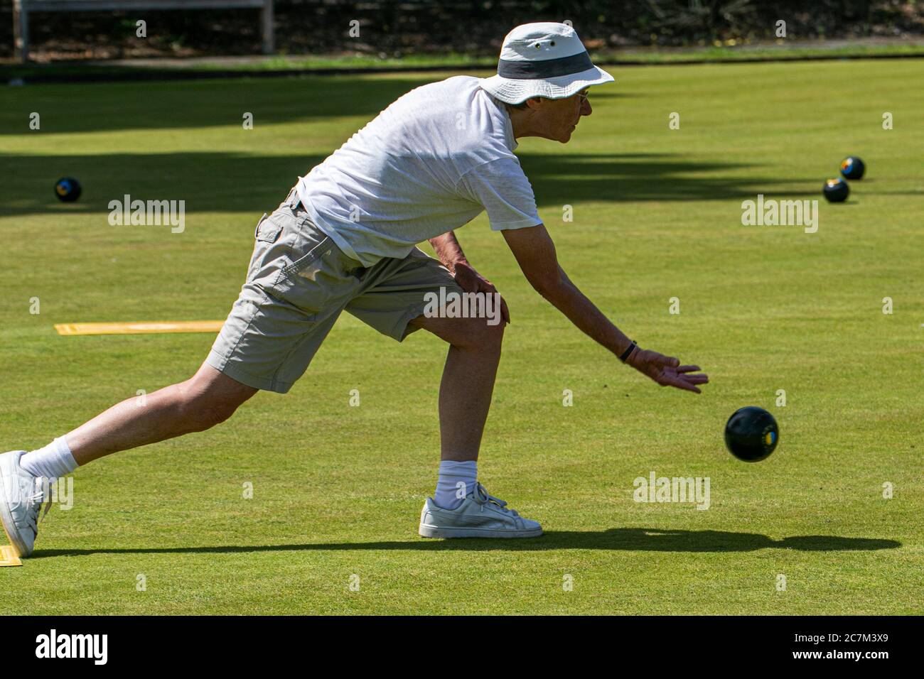 WIMBLEDON LONDON UK. 18th July, 2020. Members of the Wimbledon Park Bowls Club enjoy bowling outdoors on a hot summer day as lockdown restrictions are lifted and sport facilities reopen. Credit: amer ghazzal/Alamy Live News Stock Photo