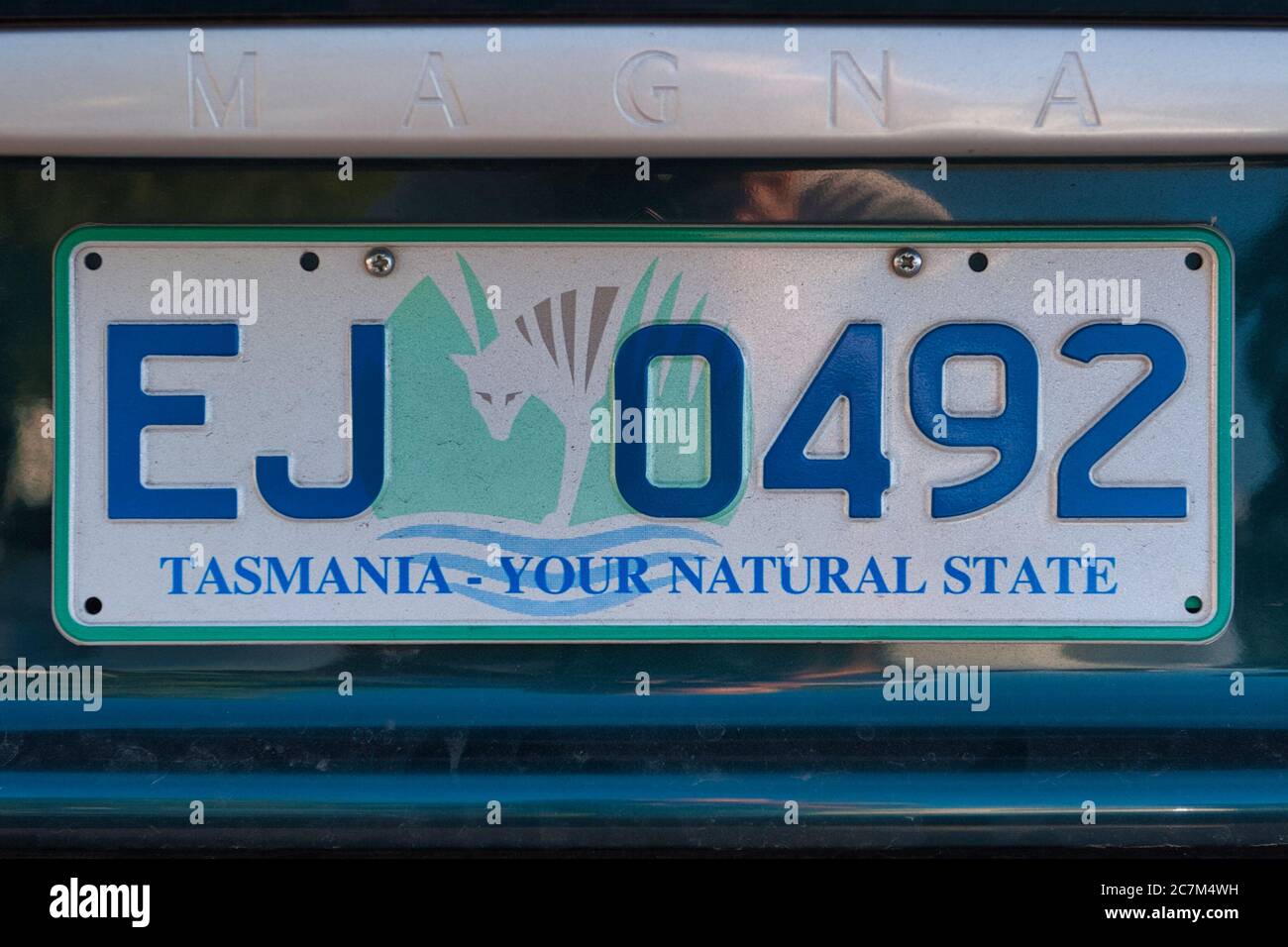 Close up of a vehicle number plate with the slogan saying Tasmania-Your Natural State, under the license numbers. Hobart, Tasmania, Australia. Stock Photo
