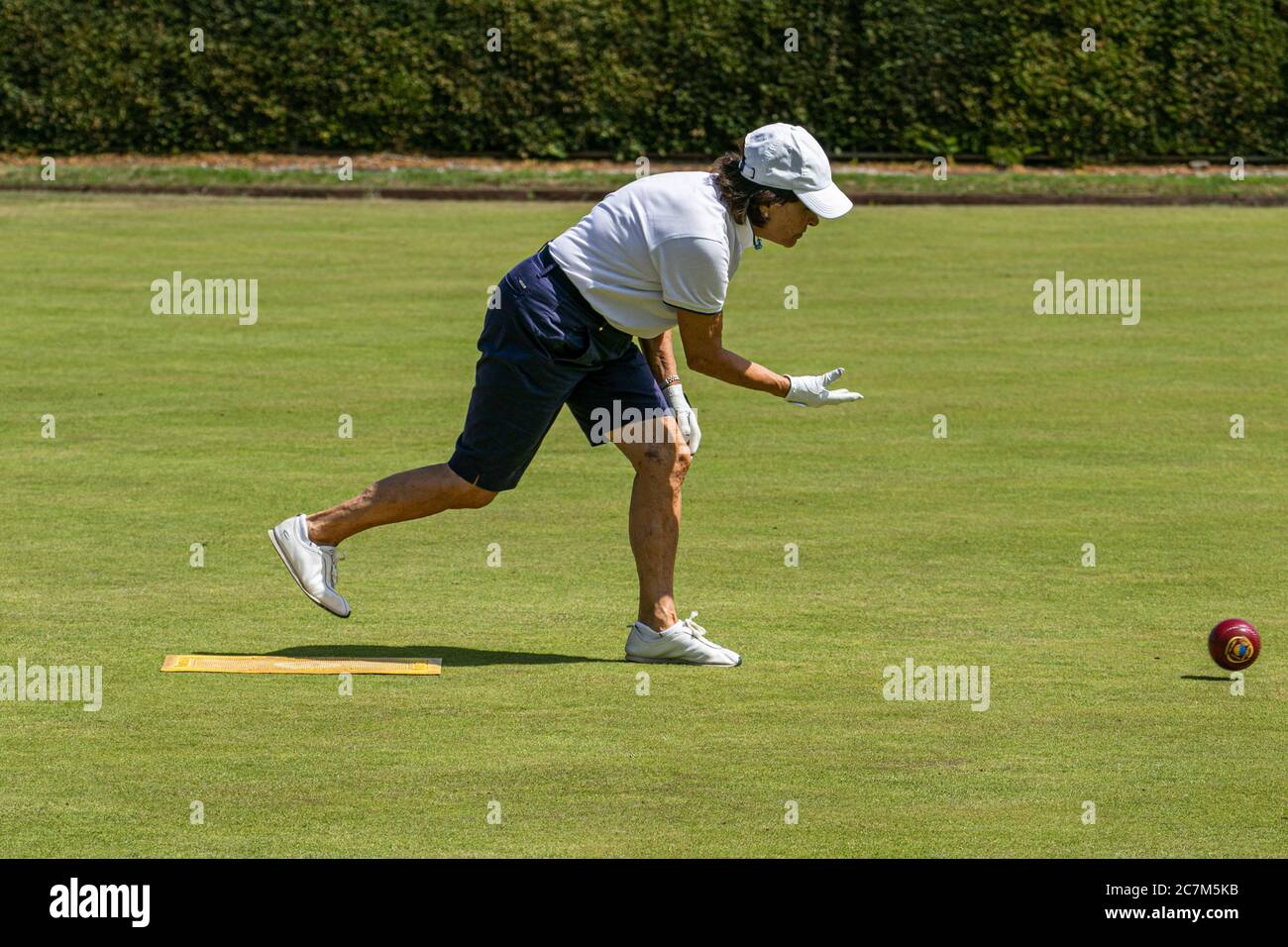 WIMBLEDON LONDON UK. 18th July, 2020. Lawn bowlers from the Wimbledon Park Bowls Club enjoy bowling outdoors on a hot summer day as lockdown restrictions are lifted and sport facilities reopen.Credit: amer ghazzal/Alamy Live News Stock Photo