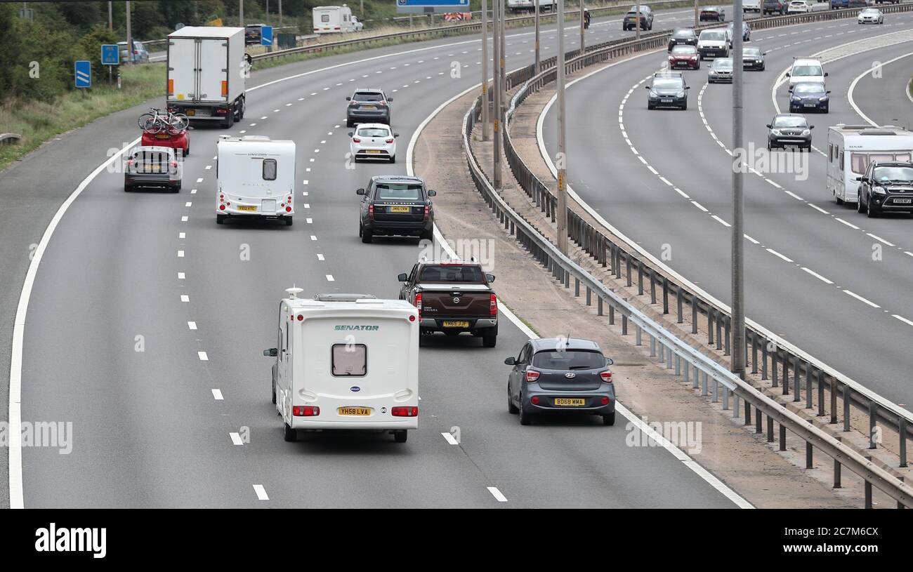 Caravans on the M5 south bound heading to the South West of England Stock Photo Alamy