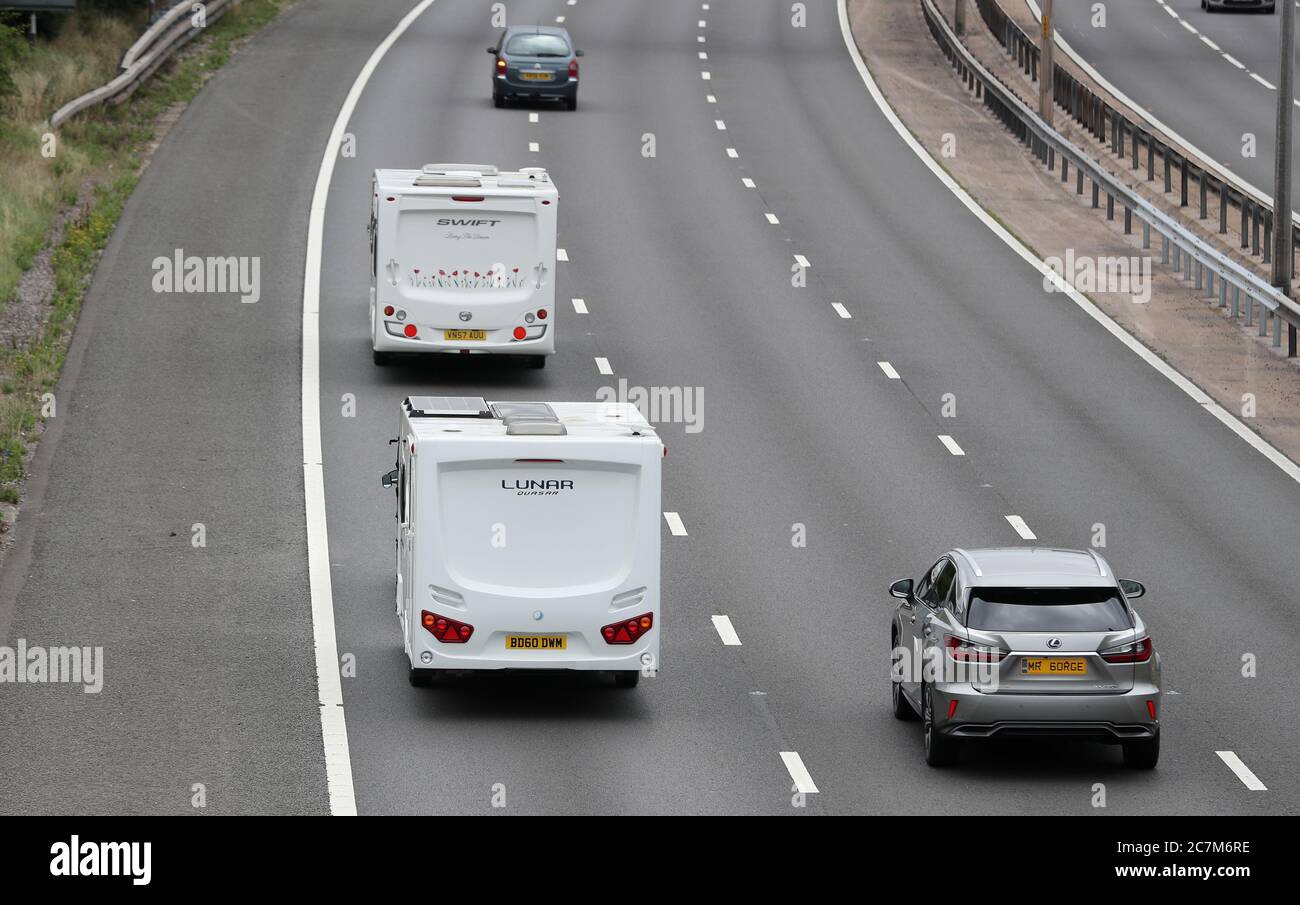 Caravans on the M5 south bound heading to the South West of England Stock Photo Alamy