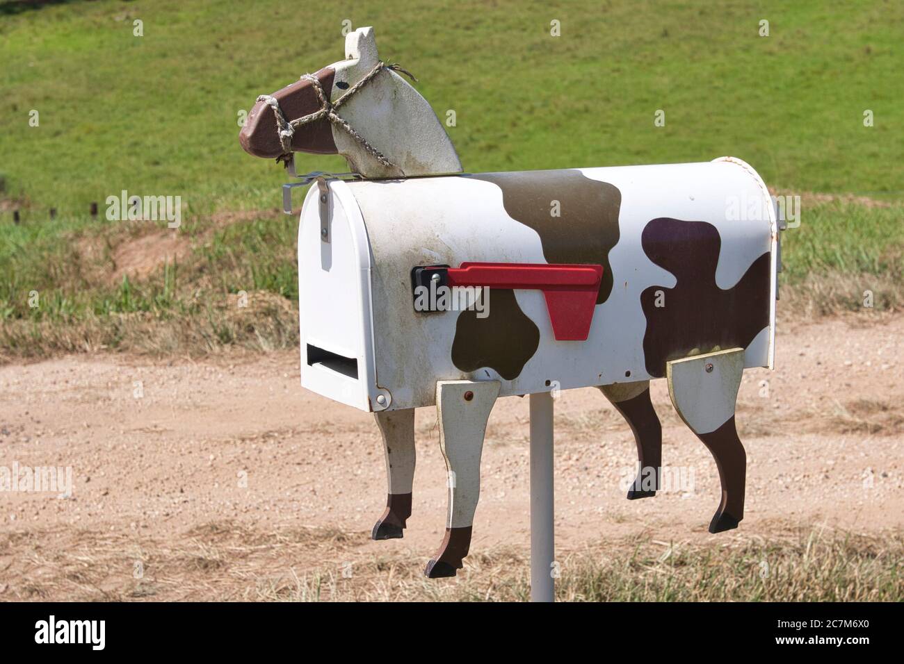 A letter and mail box at entrance to an Australian farm, made to look like and animal with the addition of legs and head. New South Wales, Australia Stock Photo