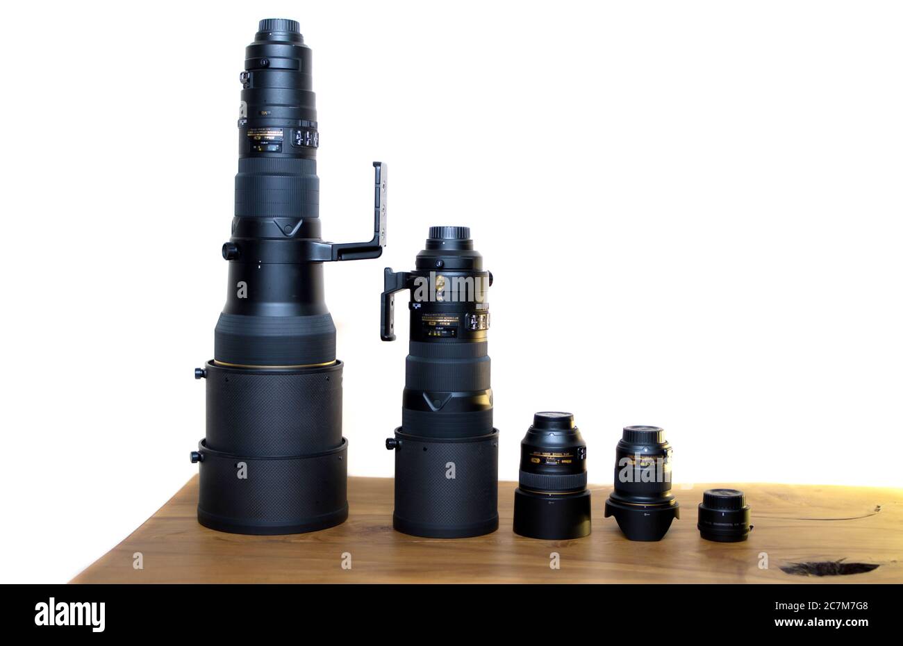 Sizes of DSLR camera lenses with a white background Stock Photo Alamy