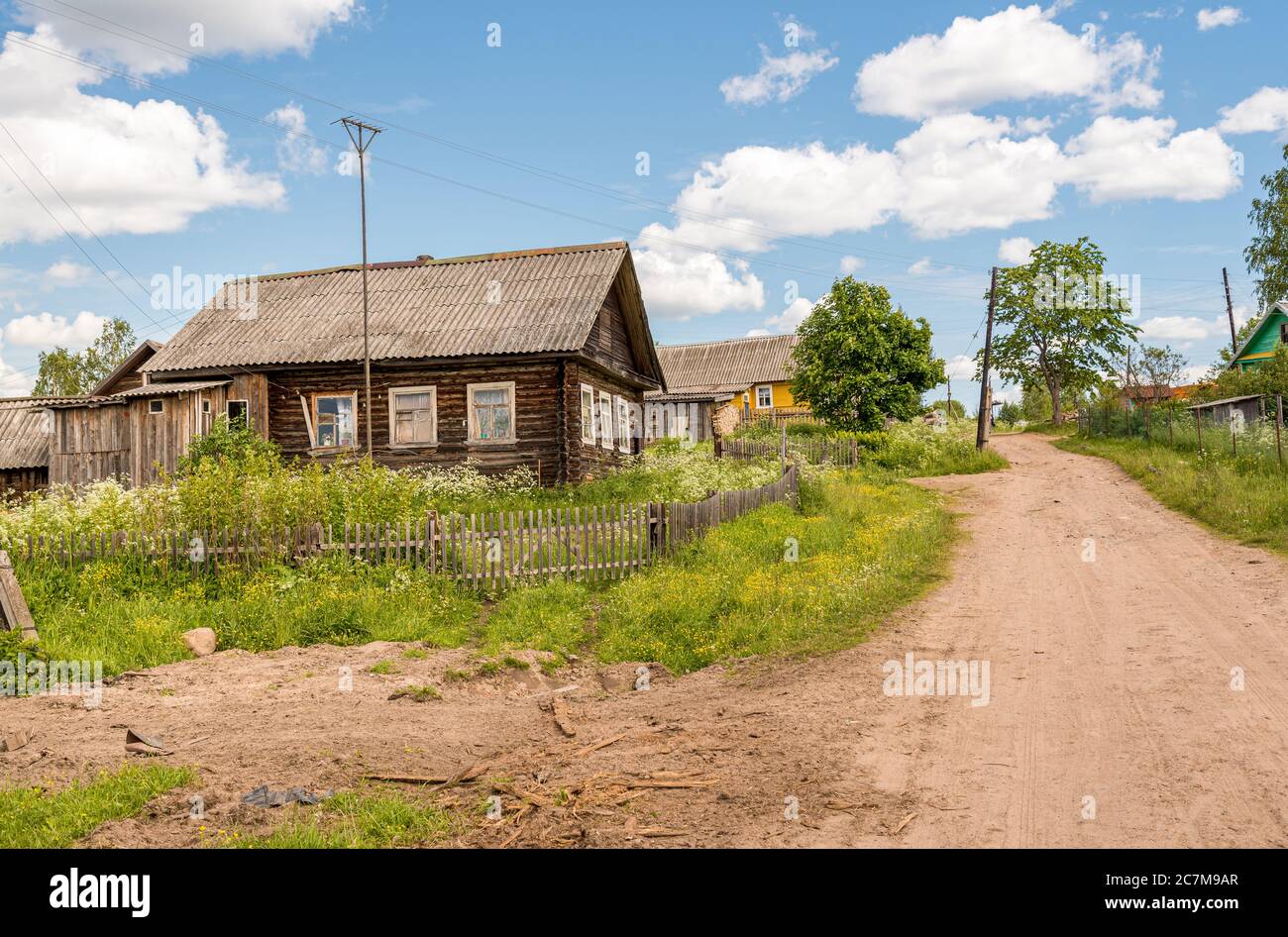 Rural road with old wooden house in an old village of Russia Stock ...